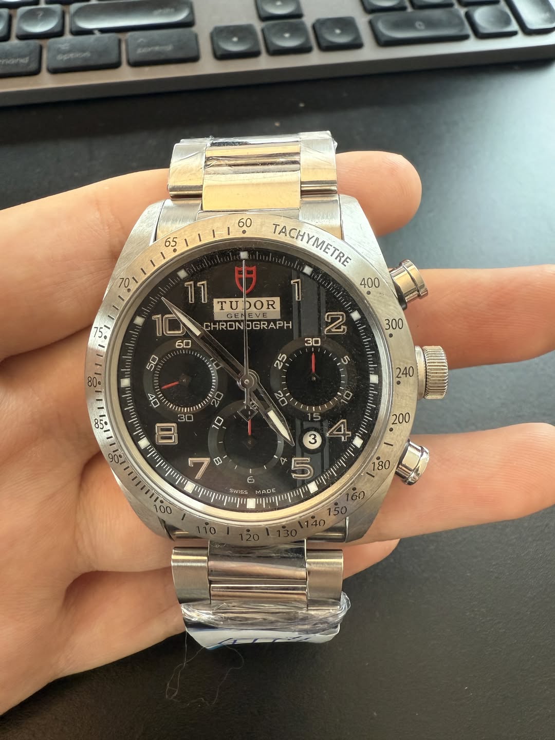 May be an image of wrist watch and text