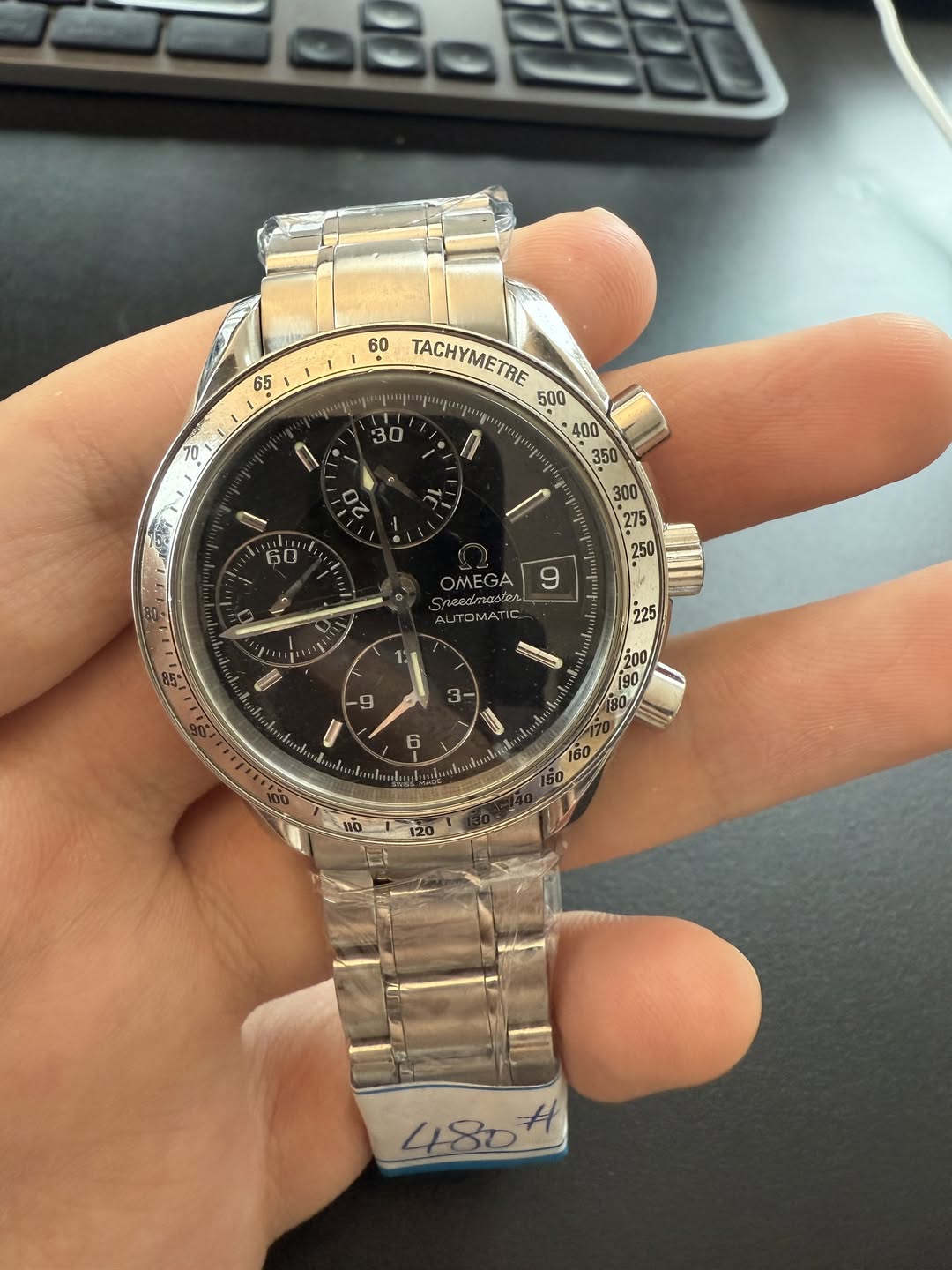 May be an image of wrist watch and text that says 'ဝဝ်ခမ 65 D 60 TACHYMETRE ጣ ارراید liil OMEGA 9 ΛυΤΕMATE ም 人 225 9 3- U 6 I กลี้น 160 480'