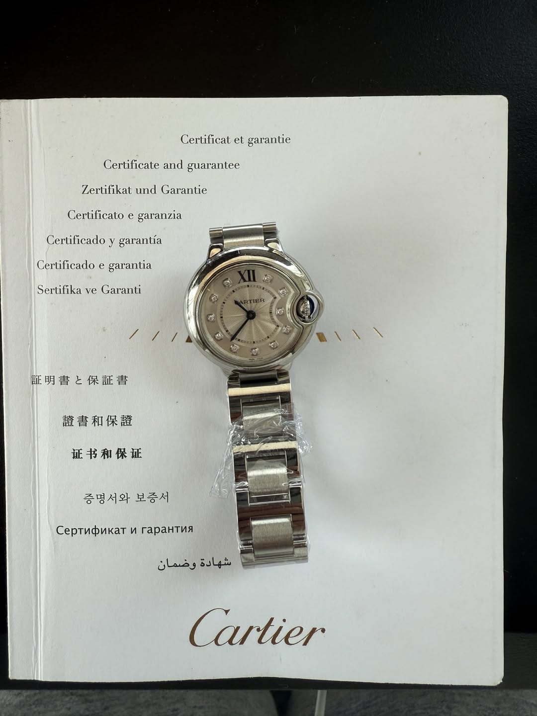May be an image of wrist watch and text that says 'Certificat et. garanlie Certificate Certificateandguarantee and guarantee Zertifikat und Garantic Cerlilicato…