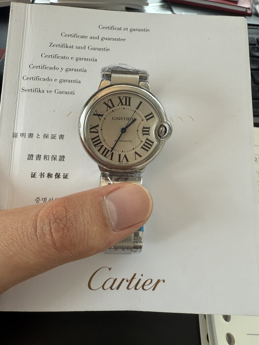 May be an image of wrist watch and text that says 'Certificat el et garantie Certificate and guarantee Zertifikat und Garantie Certificato garanzia Certificado y garantía…