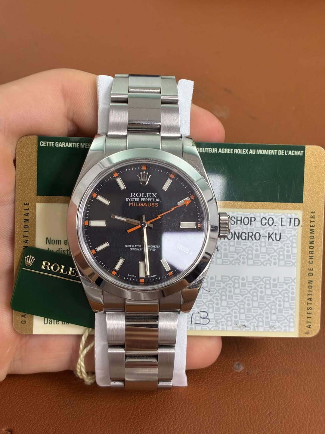 May be an image of wrist watch and text