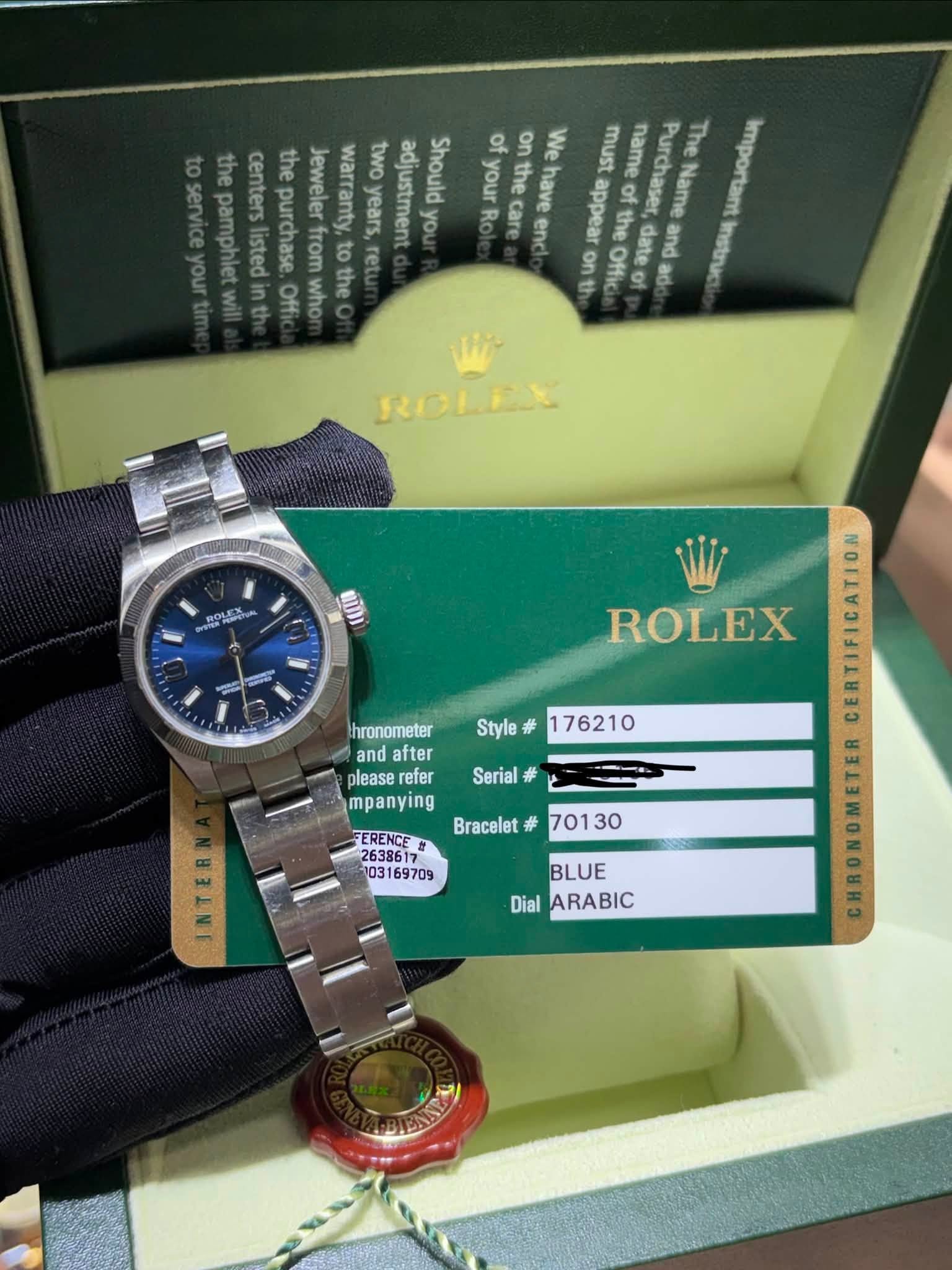 May be an image of wrist watch and text that says 'oF on We must of name Purchaser the pamp center pamphiet Jeweler warranty ពូម years, two adjustment you Should your have e Offic…