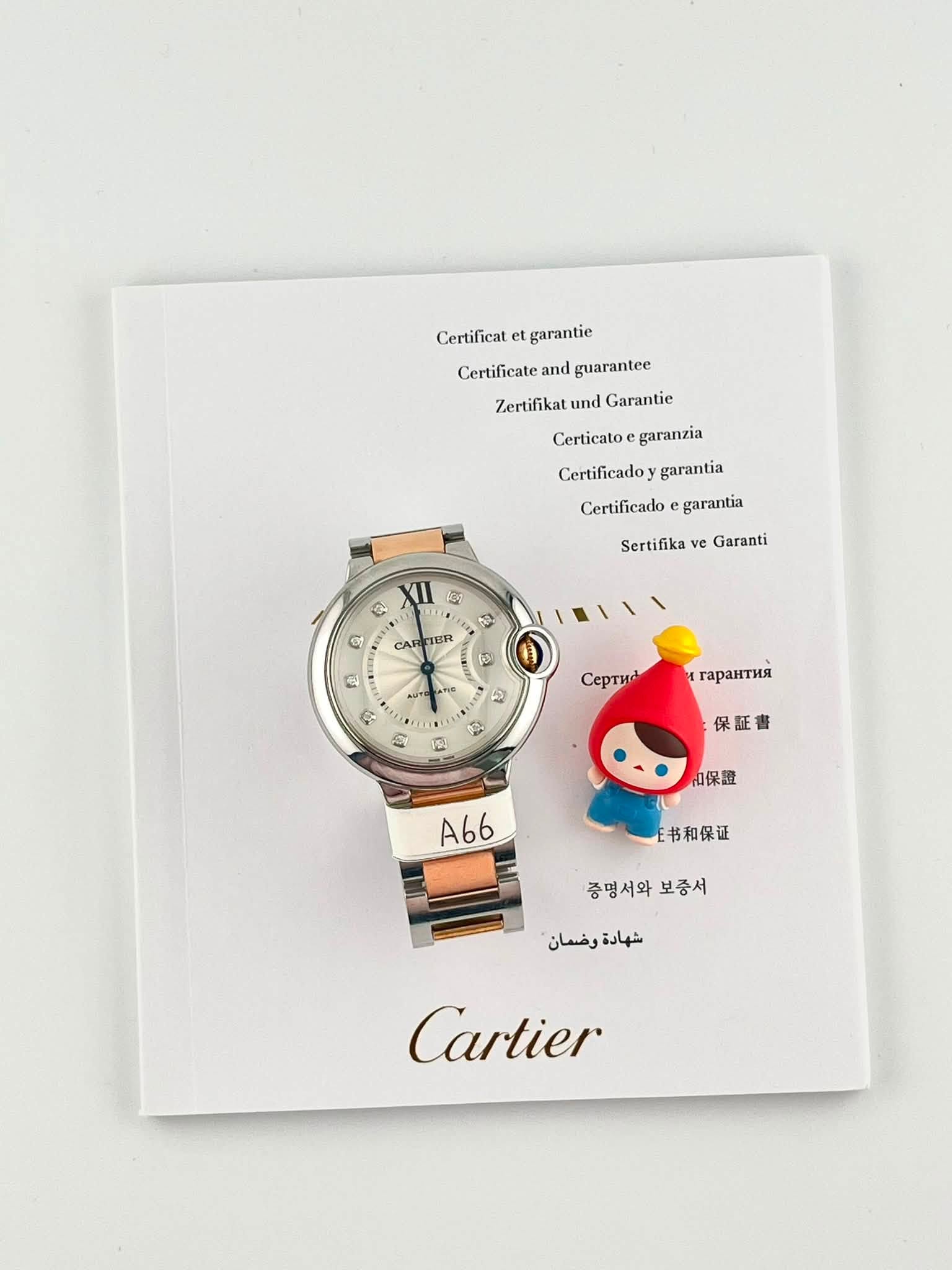 May be an image of wrist watch and text that says 'Certificat garantie Certificate and guarantee Zertifikat and Garantie Certicato garanzia Certificadoy garantia Certificado…