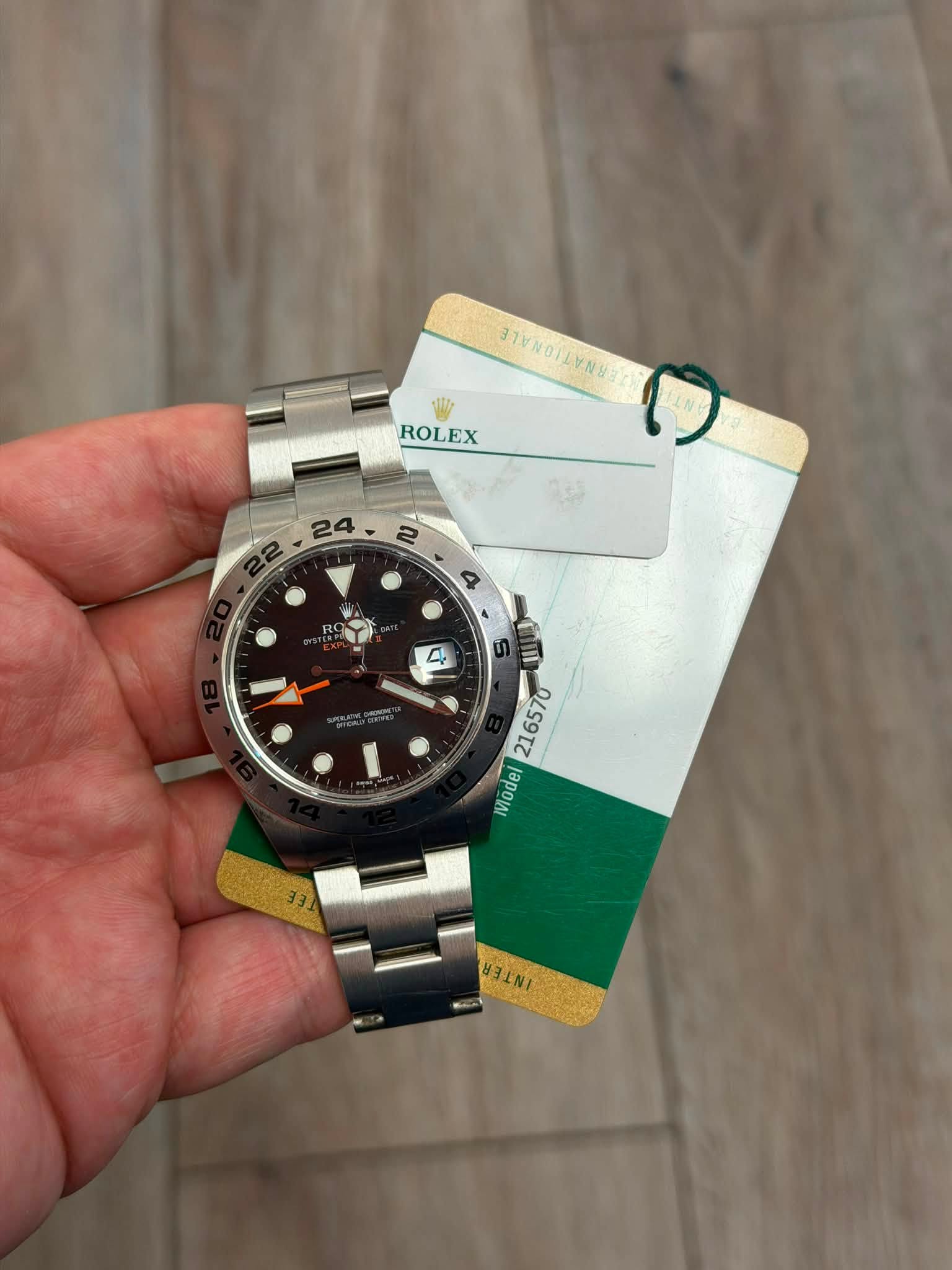 May be an image of wrist watch and text
