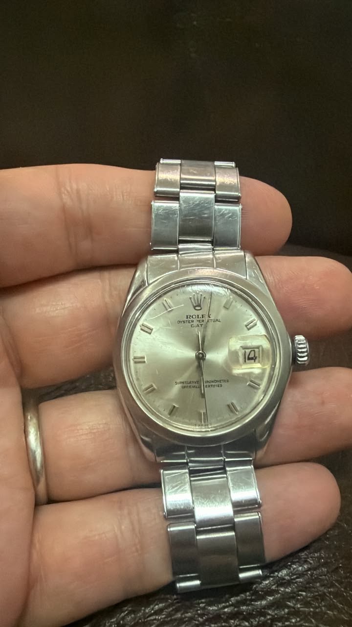 May be an image of wrist watch and text that says 'W ROLE 어Y방T지 STE ERTER GAY 6ی S3 TUAL ١١ II L POWONTTE ERTIMES 회 14 S'