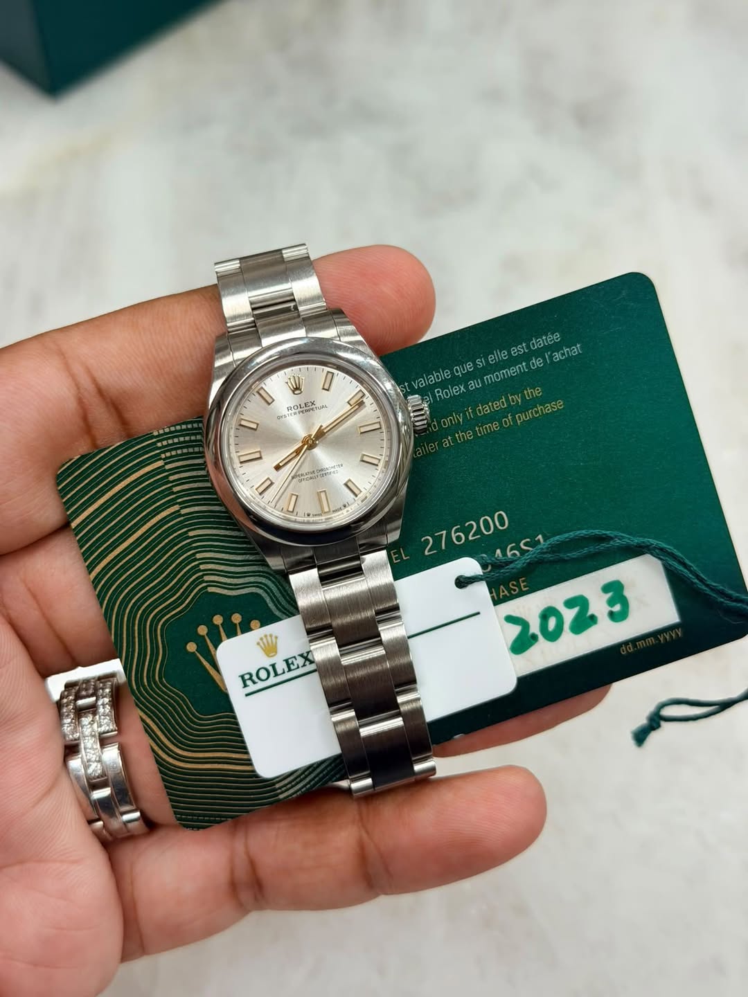 May be an image of wrist watch and text that says 'O ROL ROLE oBeлиeoR BOLEX alable que Stelle est stdatée achat moment de Rolex ifdatedbythe atthetimeofpurchase purchase I D D I…
