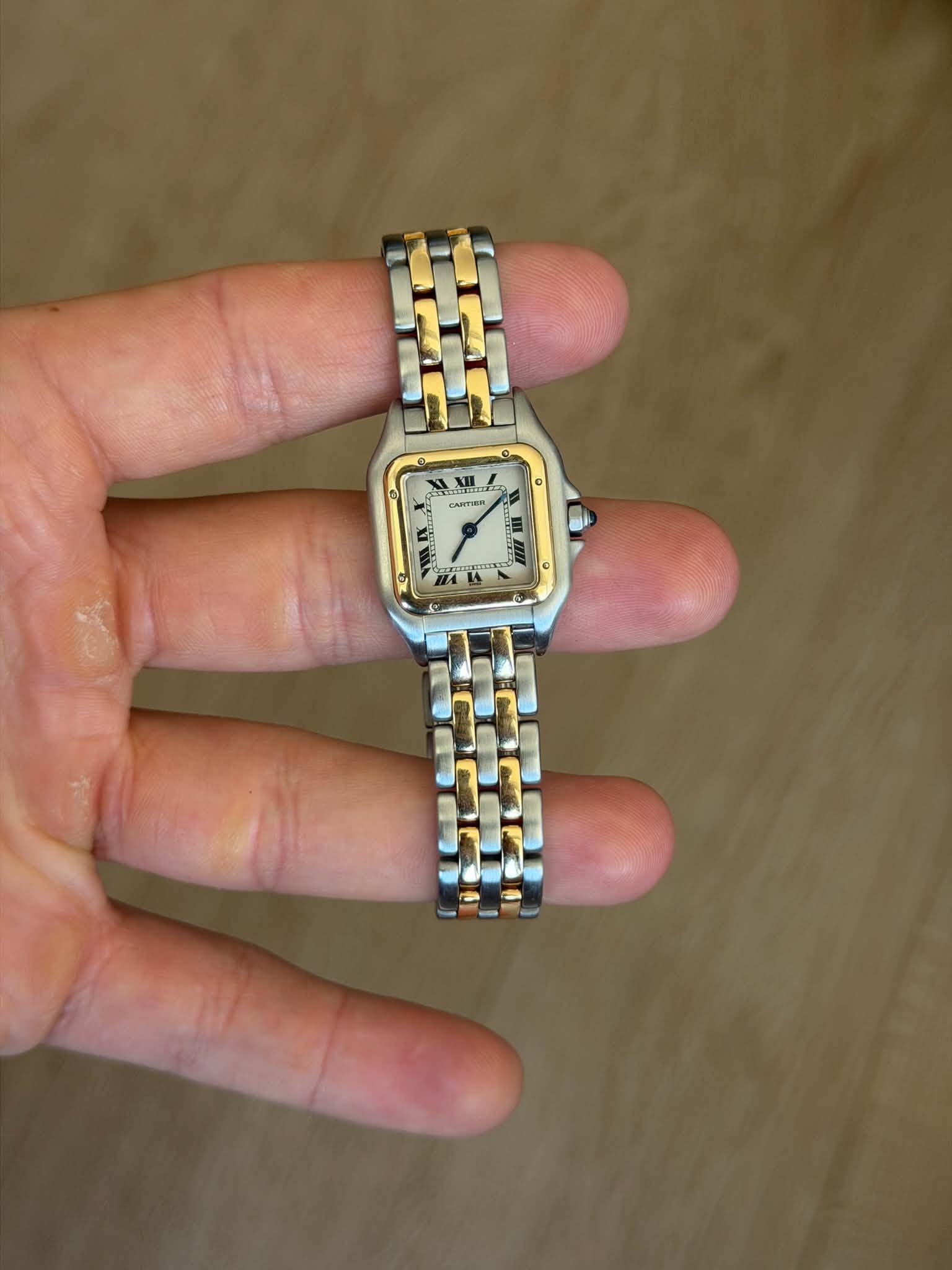 May be an image of digital watch and text