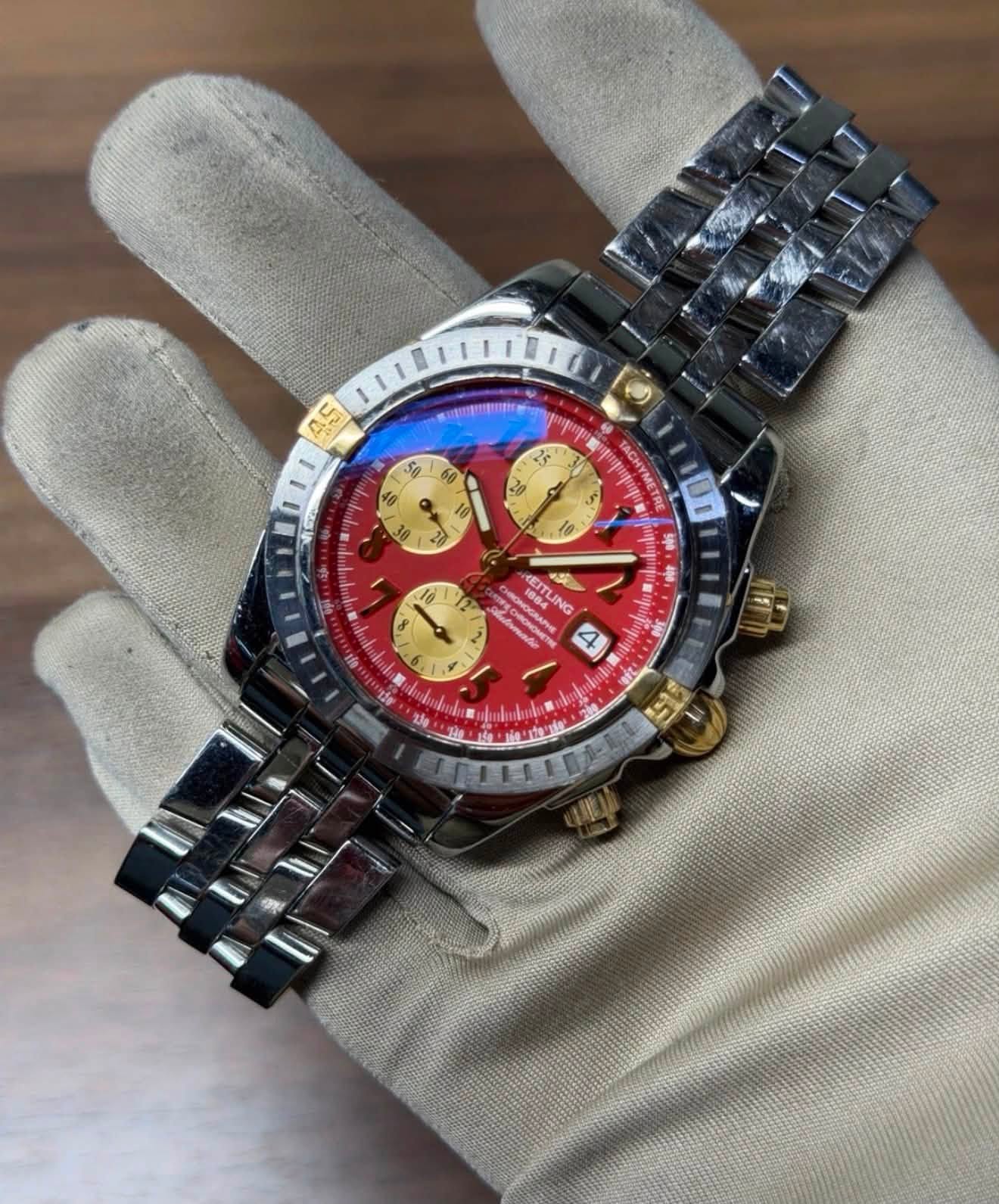 May be an image of wrist watch and text