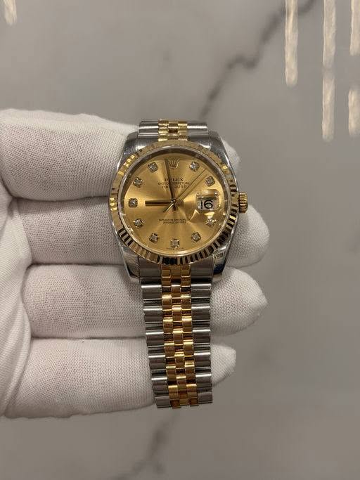 May be an image of wrist watch