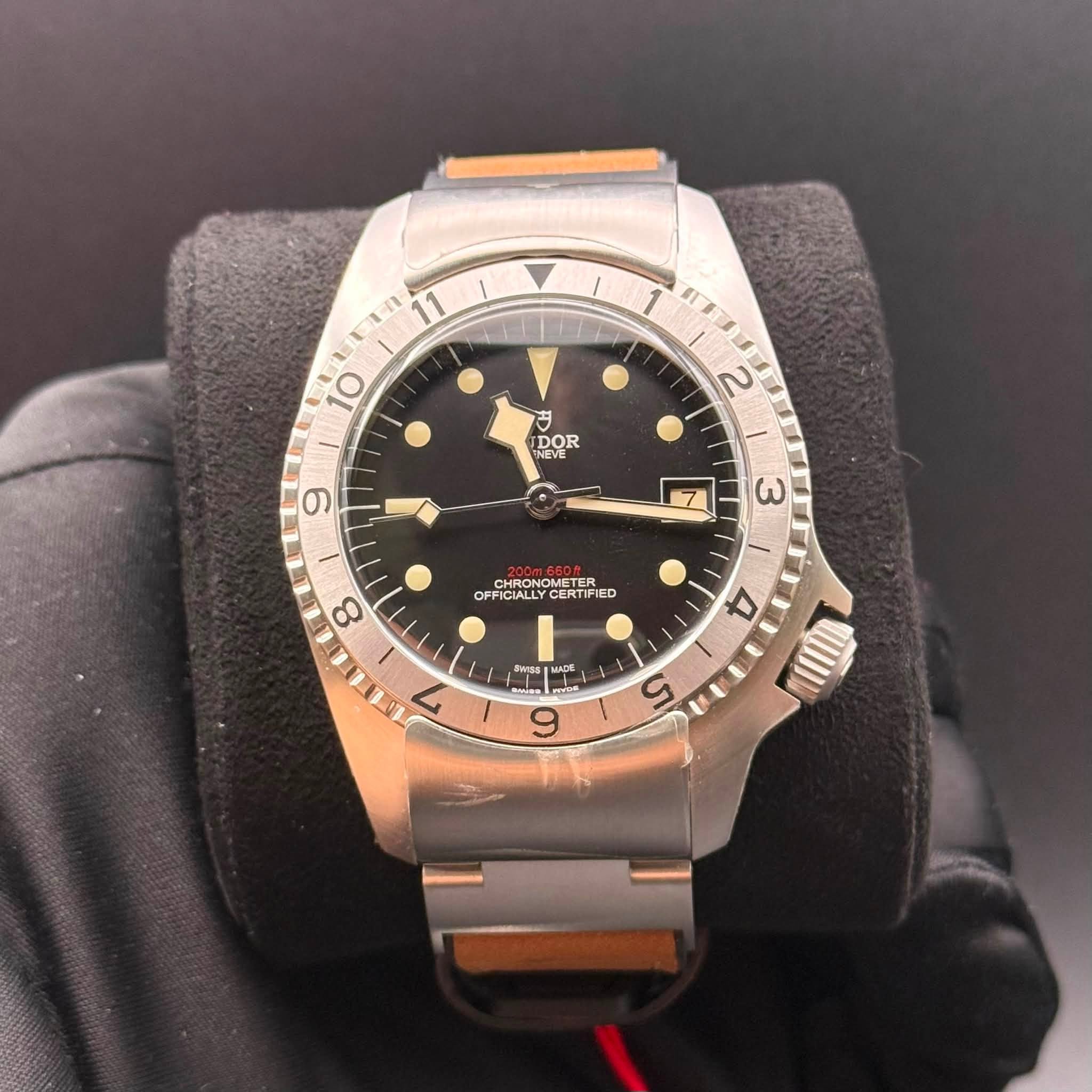 May be an image of wrist watch and text