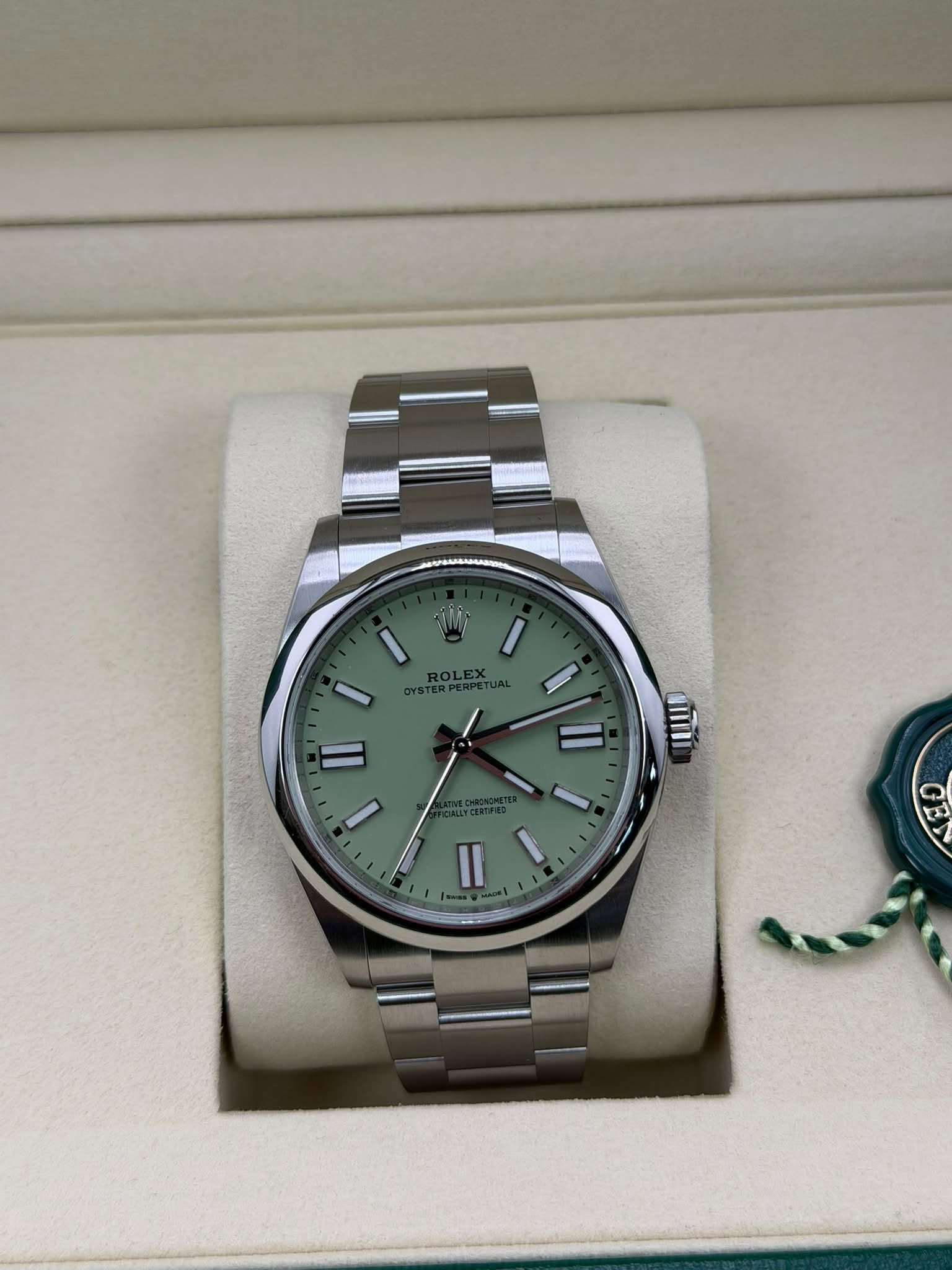 May be an image of wrist watch and text
