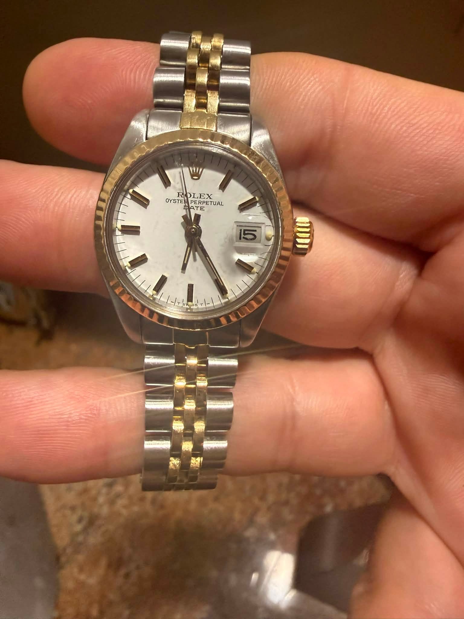 May be an image of wrist watch
