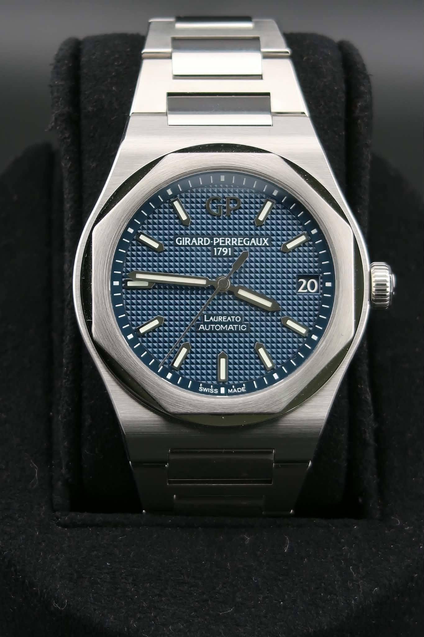 May be an image of wrist watch and text that says 'GIRARD PERREGAUX 1791 20 LAUREATO AUTOMATIC AUTOMATIC SWISS MADE'