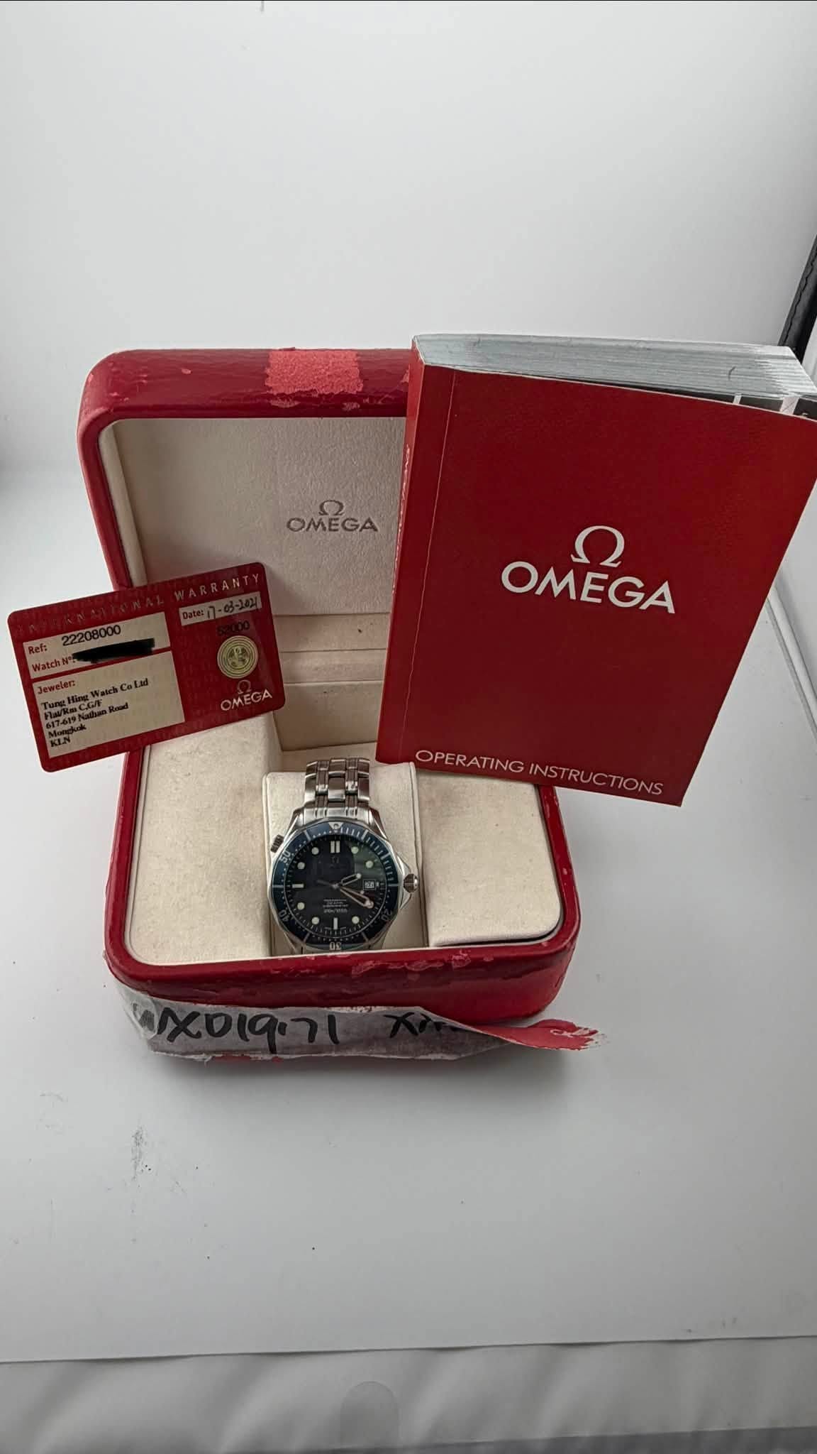 May be an image of wrist watch and text