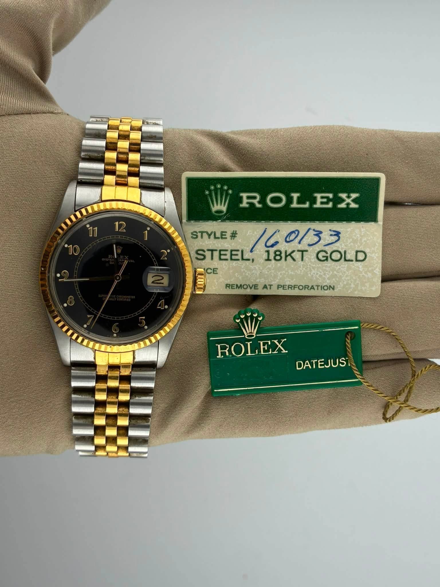 May be an image of wrist watch and text that says '12 ROLEX STYLE# 160133 STEEL, 18KT GOLD CE REMOVE AT PERFORATION ROLEX DATEJUST'