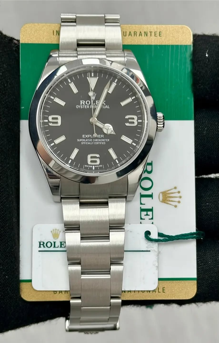 May be an image of wrist watch and text