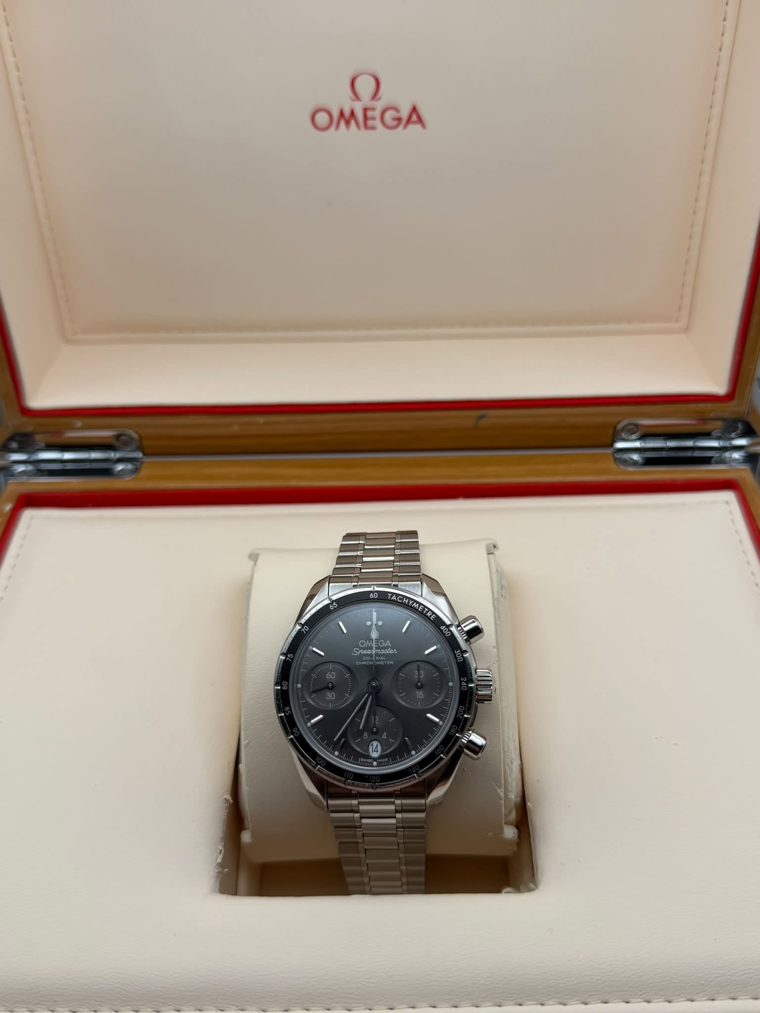 May be an image of wrist watch and text