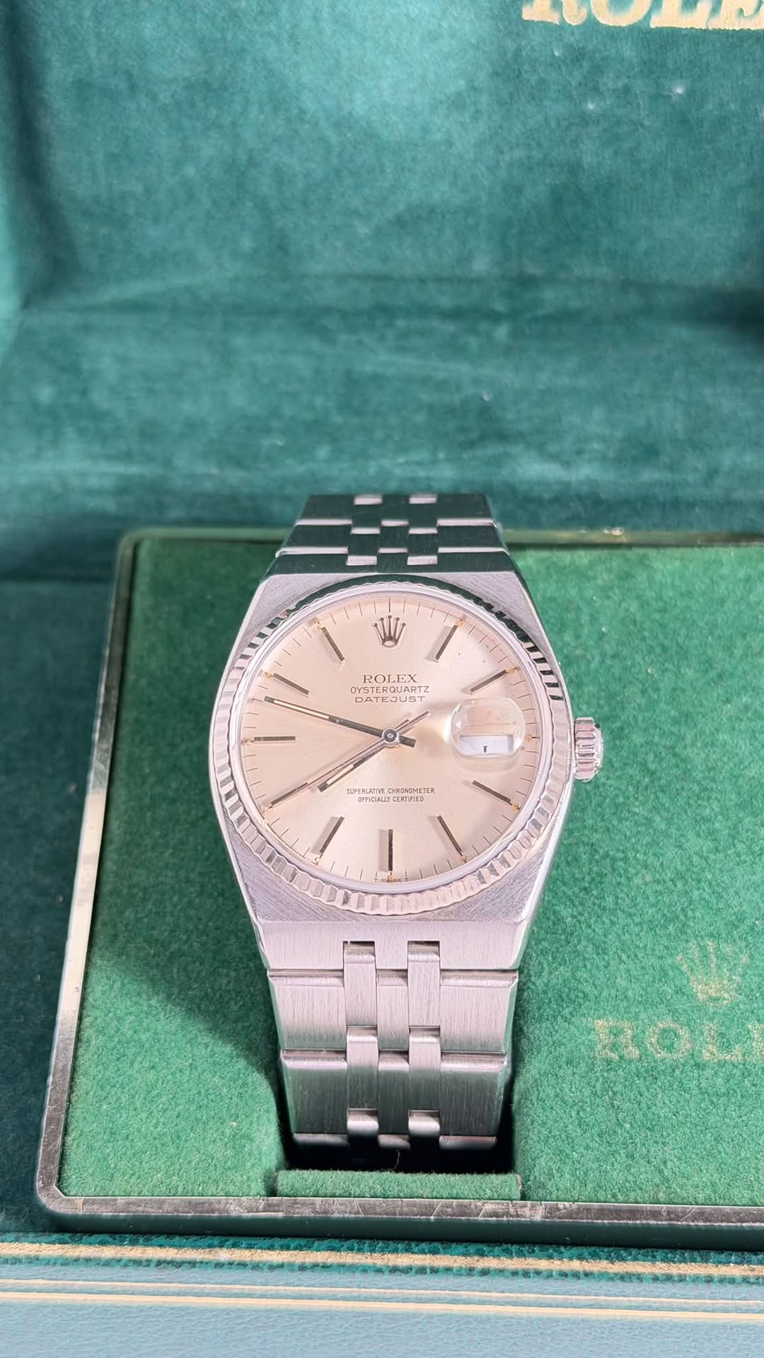 May be an image of wrist watch and text