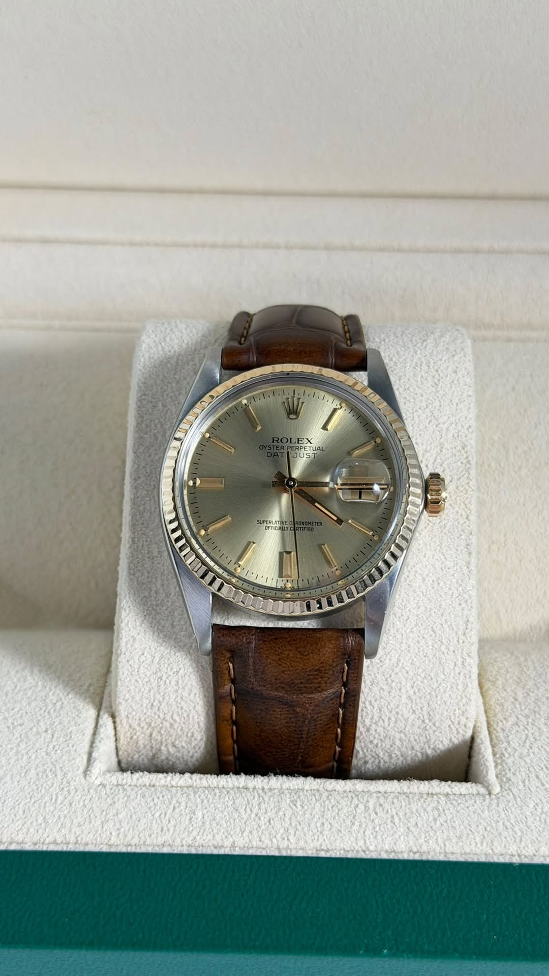 May be an image of wrist watch and text