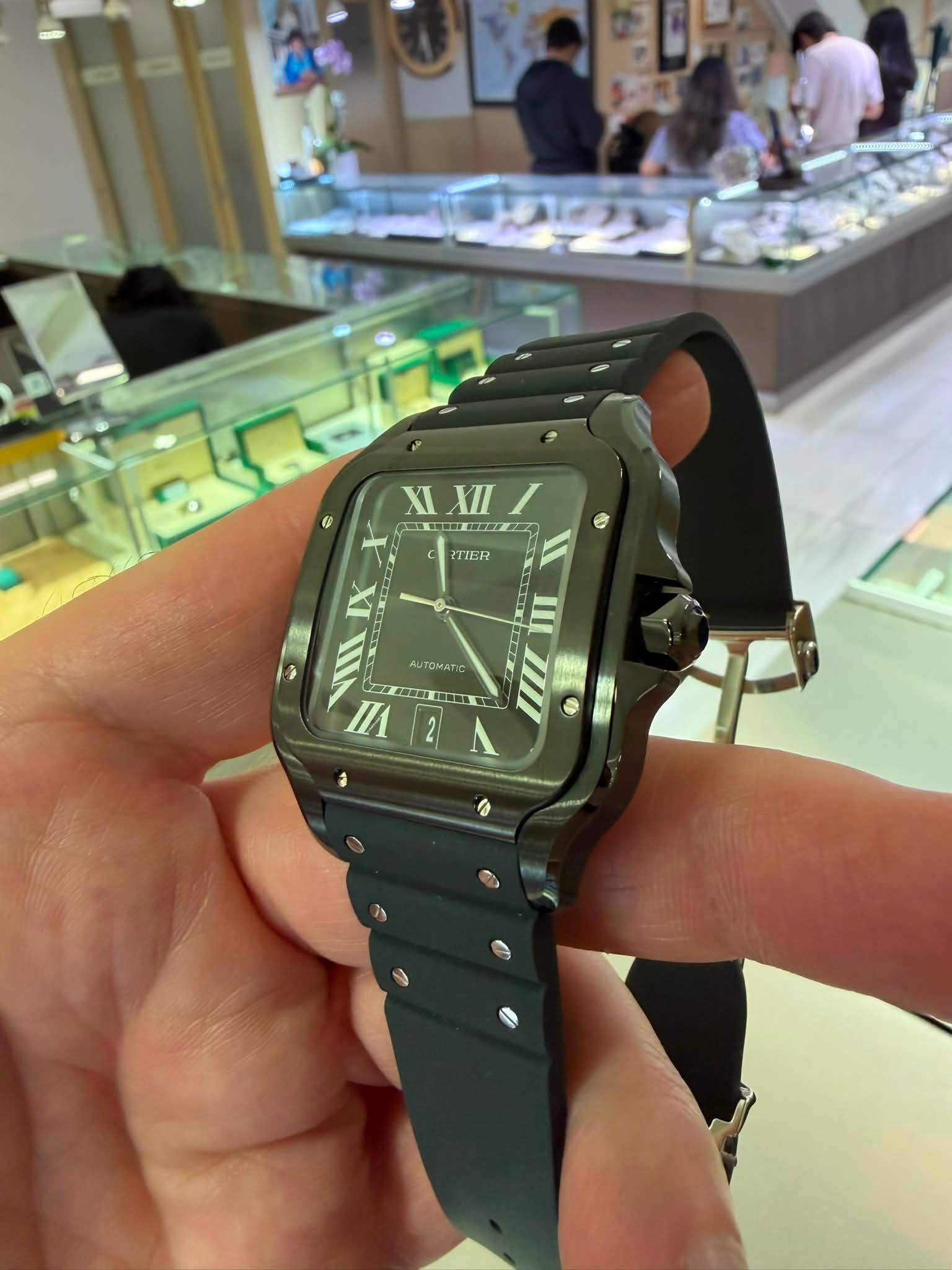 May be an image of digital watch and text that says 'XIXII XI XI 商 TIER IX AUTOMATIC III'