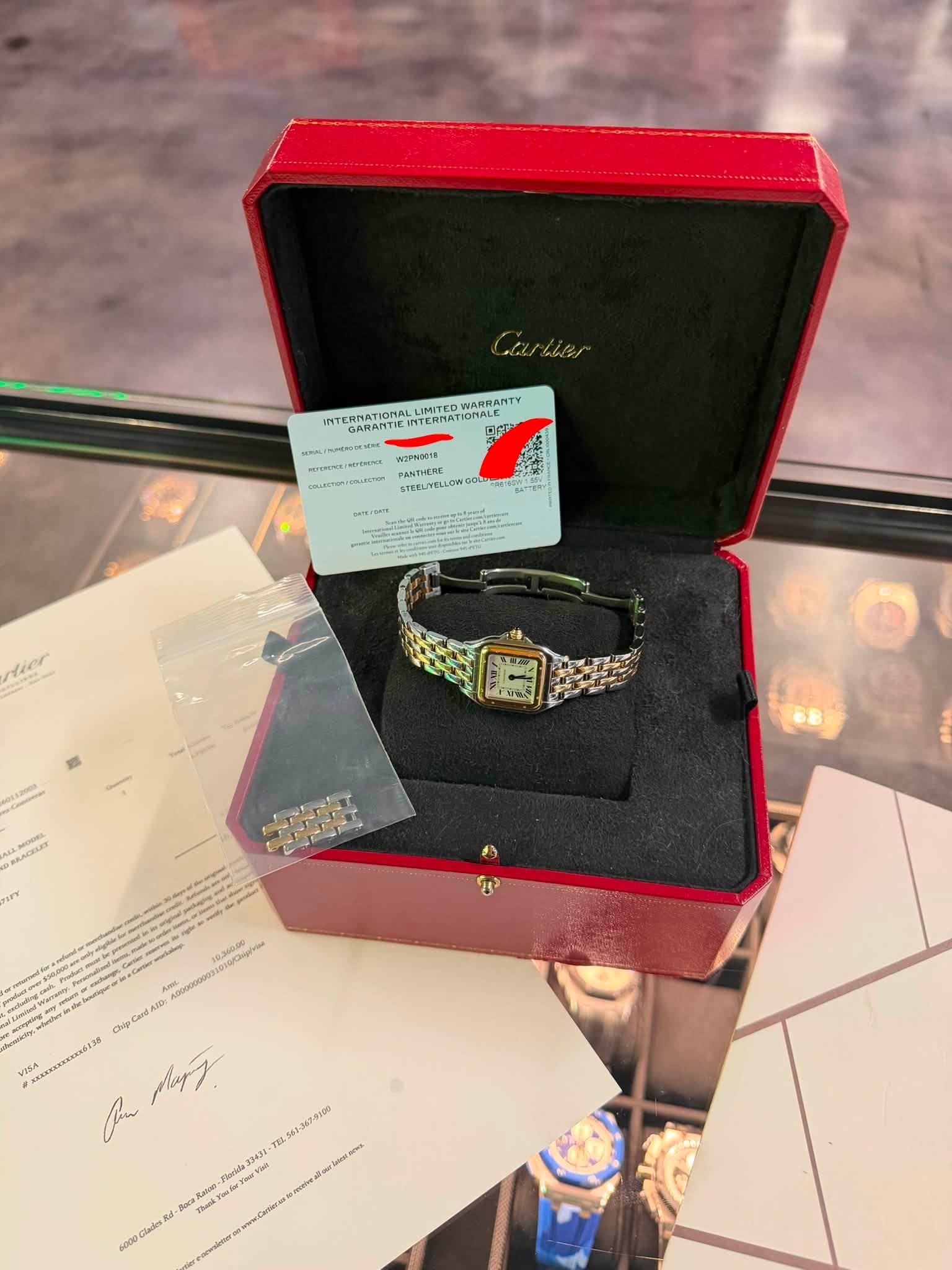 May be an image of wrist watch, jewelry and text