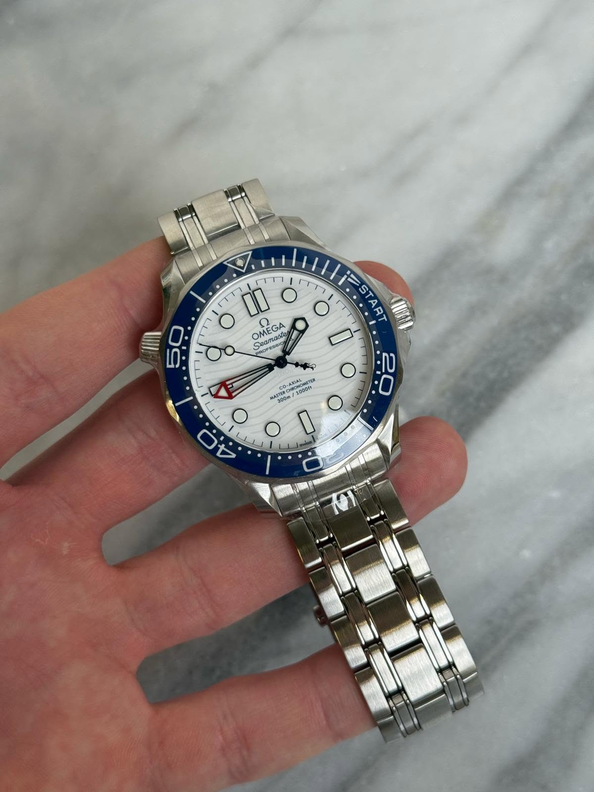 May be an image of wrist watch and text