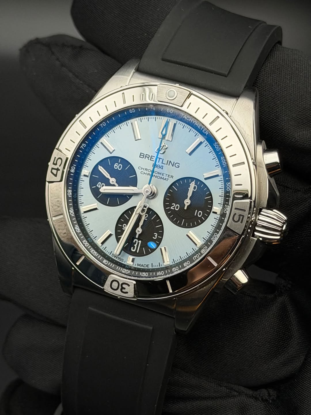 May be an image of wrist watch and text