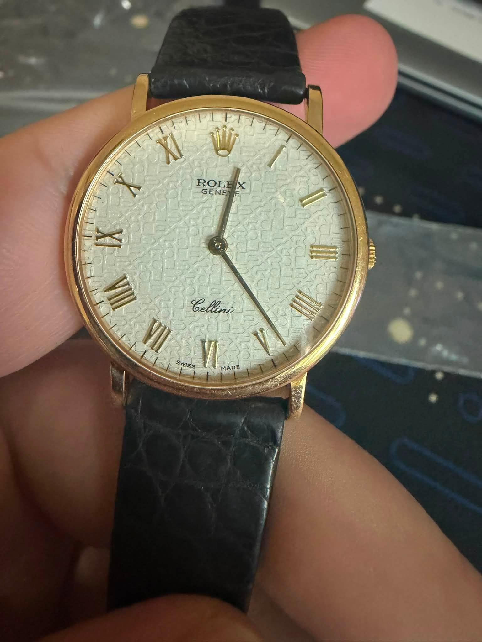 May be an image of wrist watch and text that says 'XI D ROL GENE ROLEX ROLEX X cAAЛEH Cellini Ι EЛ VII SWISS VI MADE'