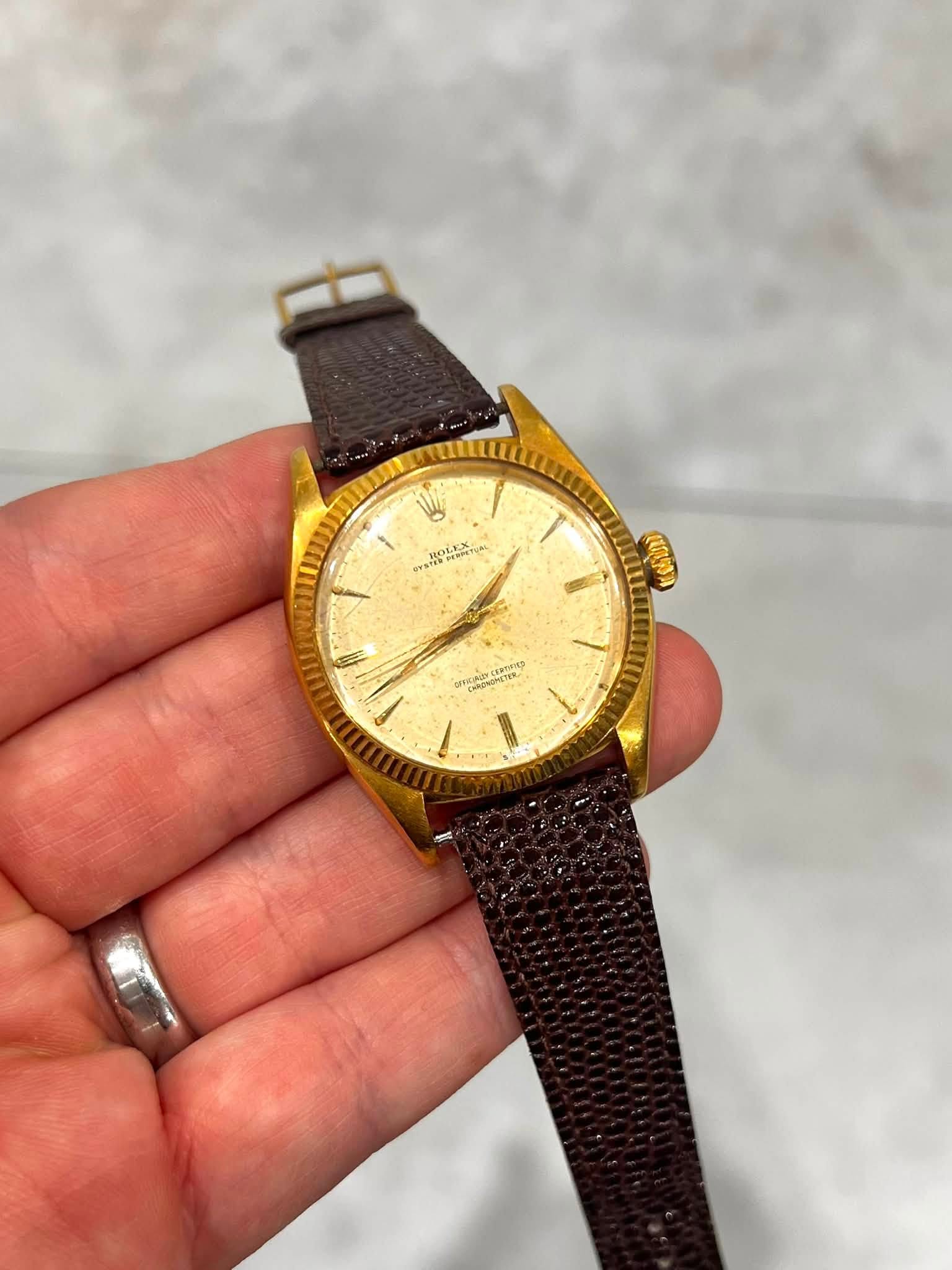 May be an image of wrist watch