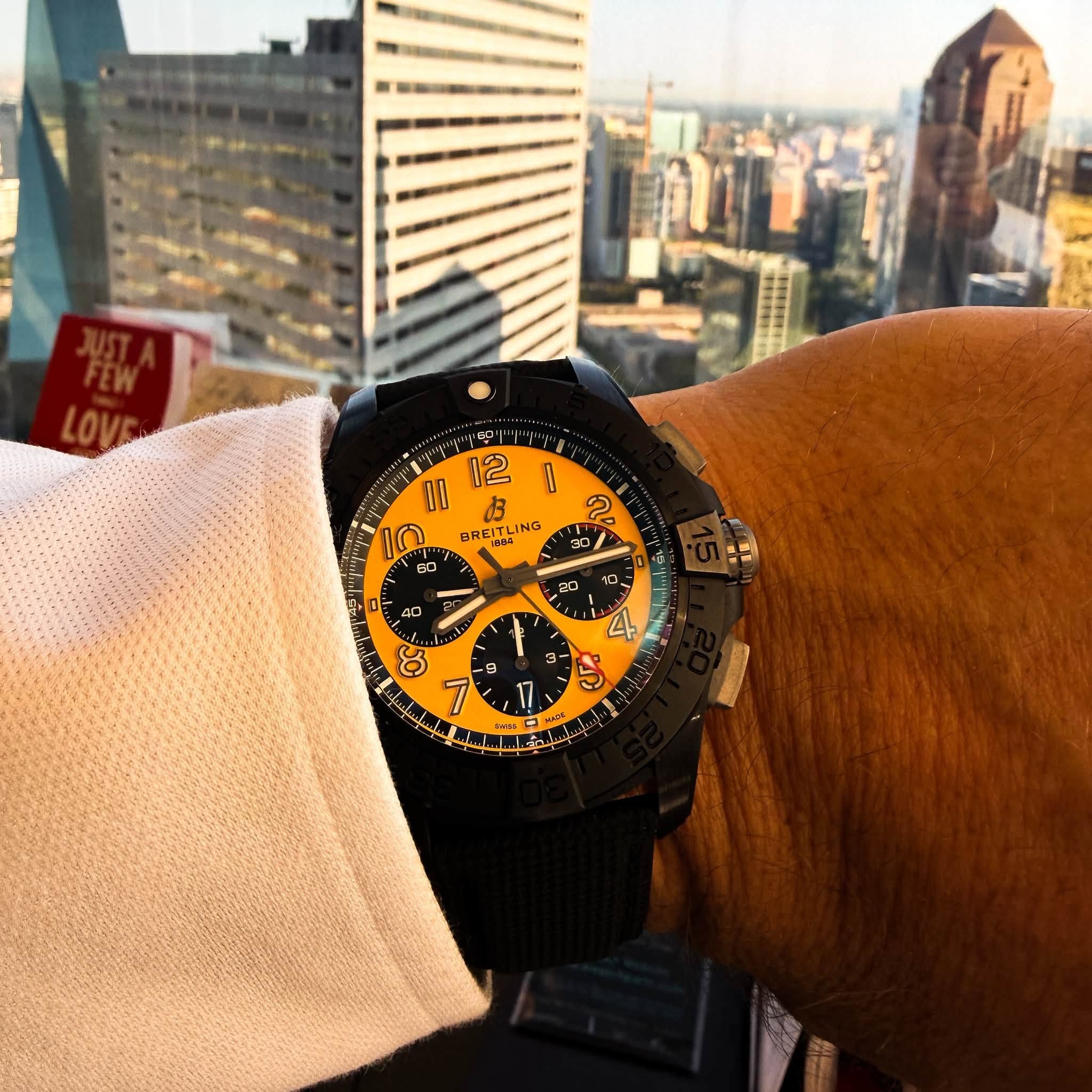 May be an image of wrist watch and text that says 'JUST.A FEW LOVE II 12 10 BRE BREITLING BREITL ING NG 80 I ဟ 30 40 20 ١ ١ - - 4 3 3- B =- 9 7 HADK wes'