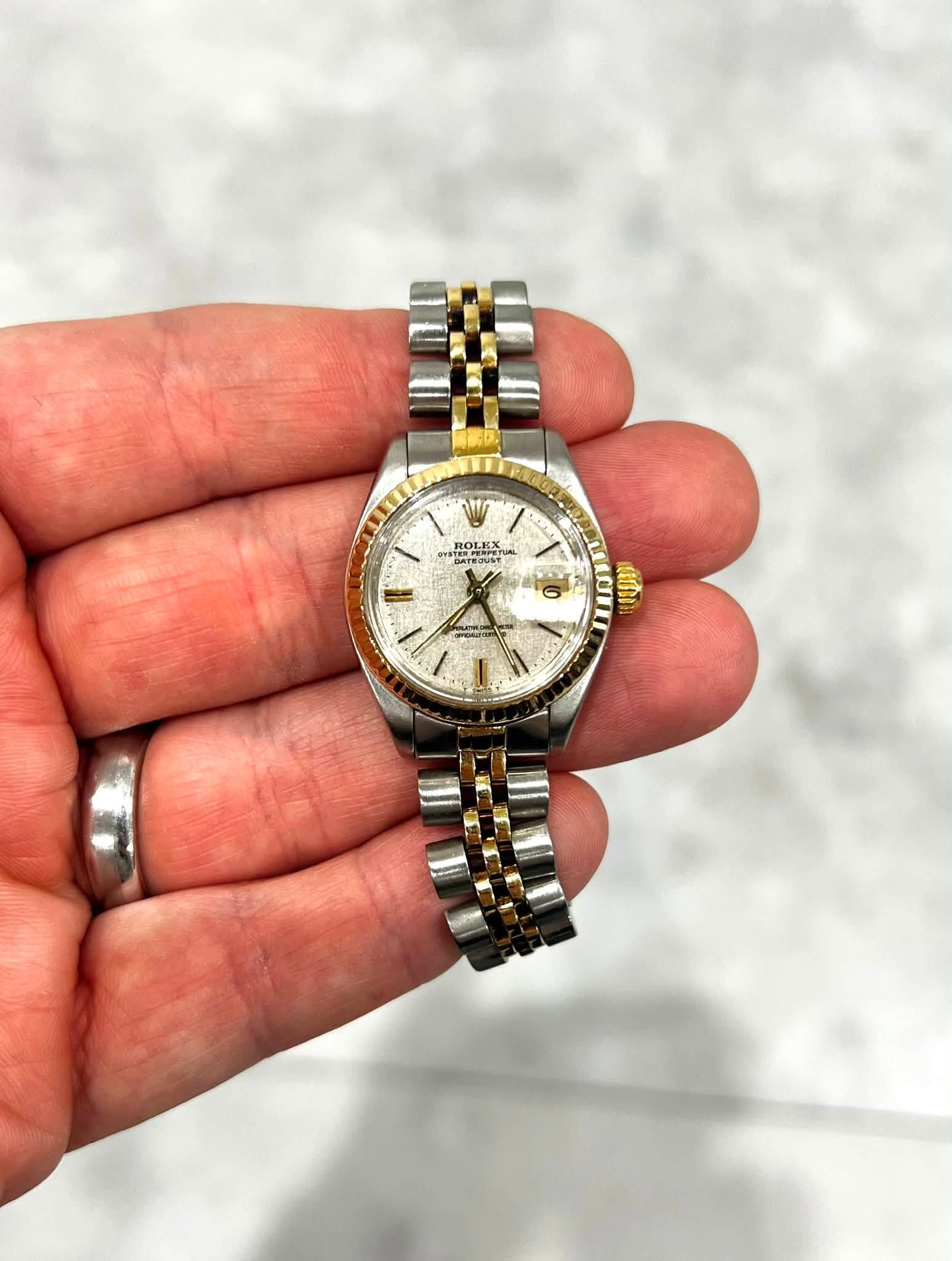 May be an image of wrist watch