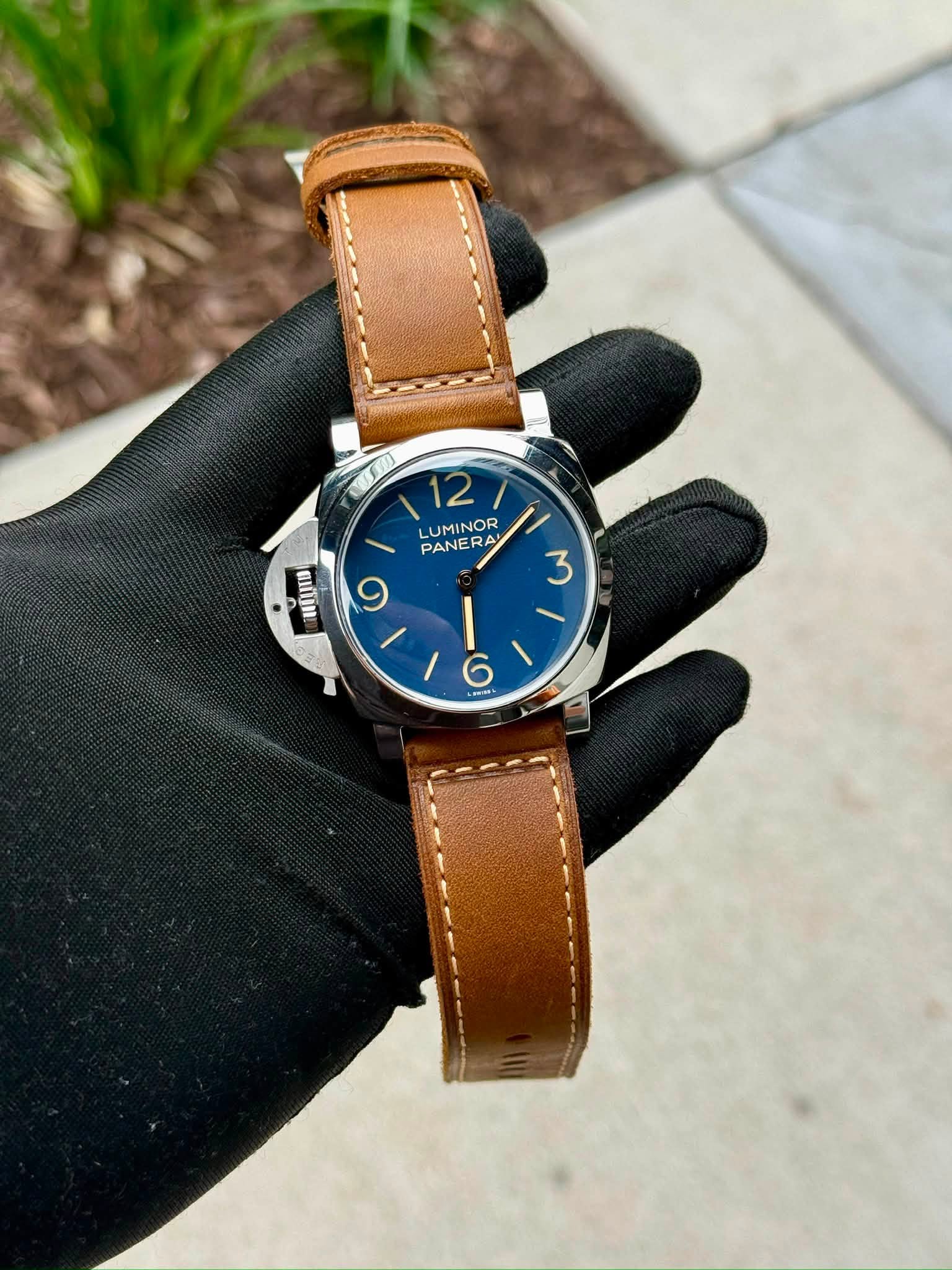 May be an image of wrist watch, leather and text that says '12 LUMINOR RA ית PAN PANER 9 HEUIS EEU 3 I 6 REmL A'