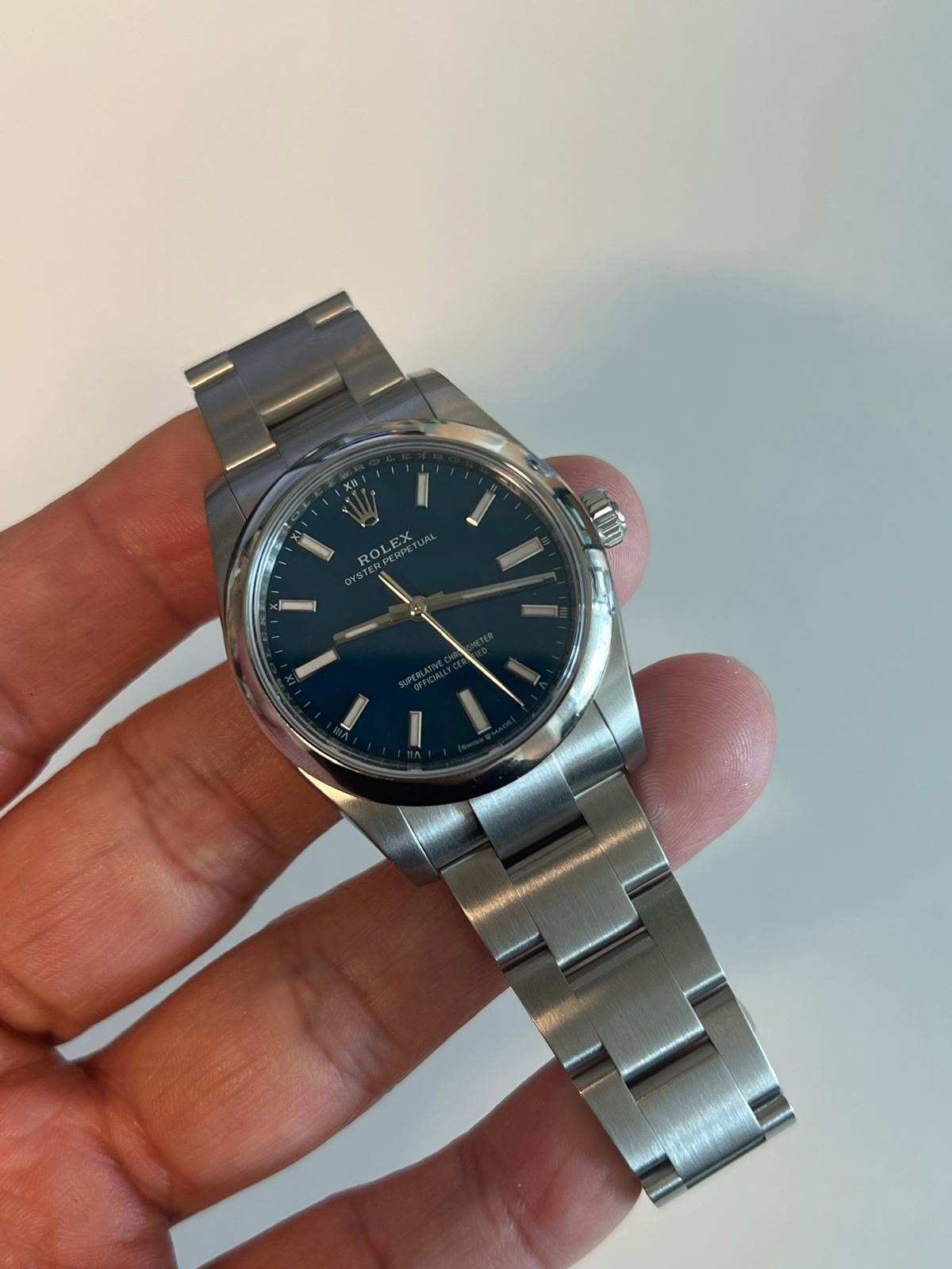 May be an image of wrist watch and text that says 'ROLEX'