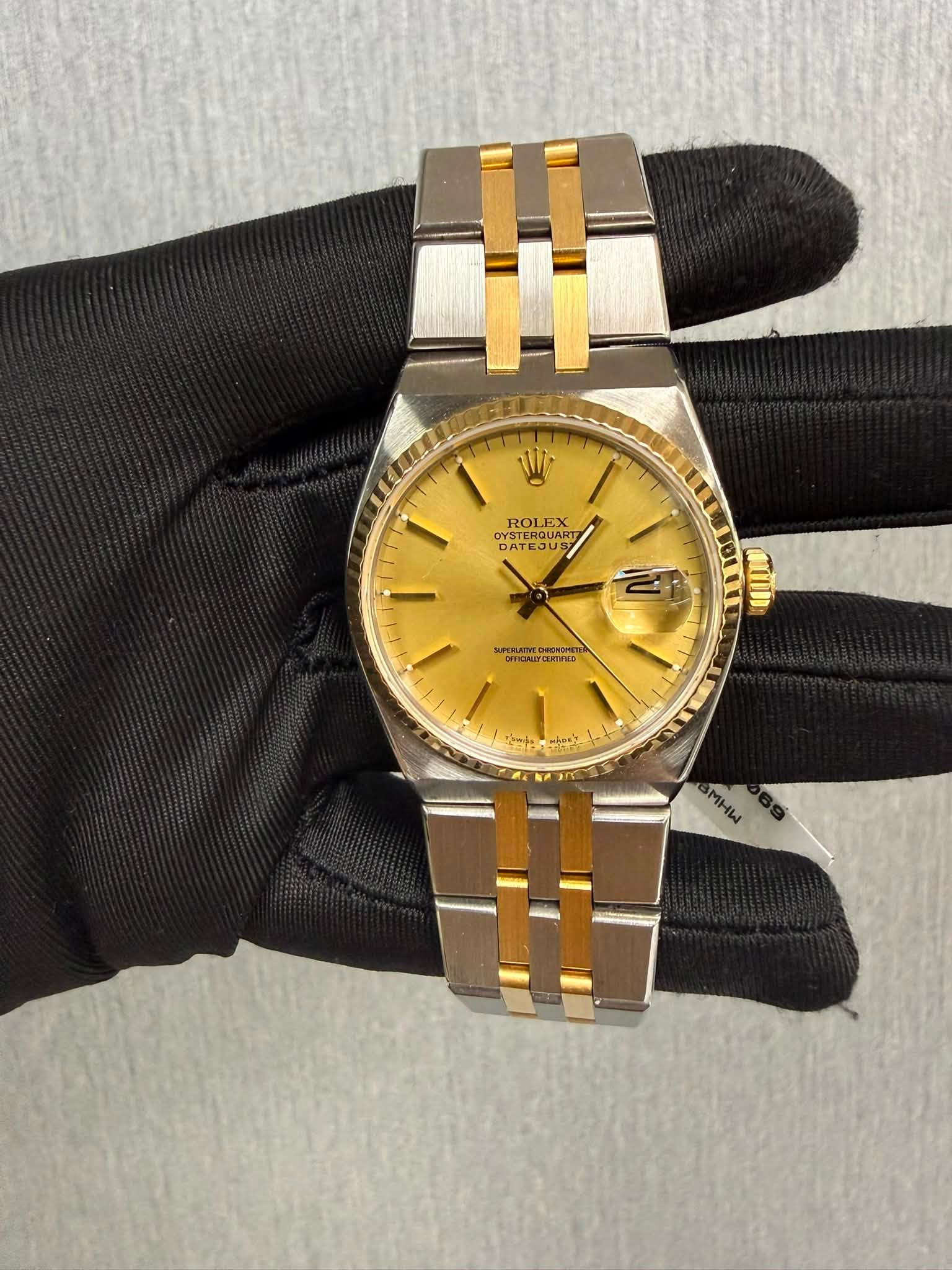 May be an image of wrist watch and text