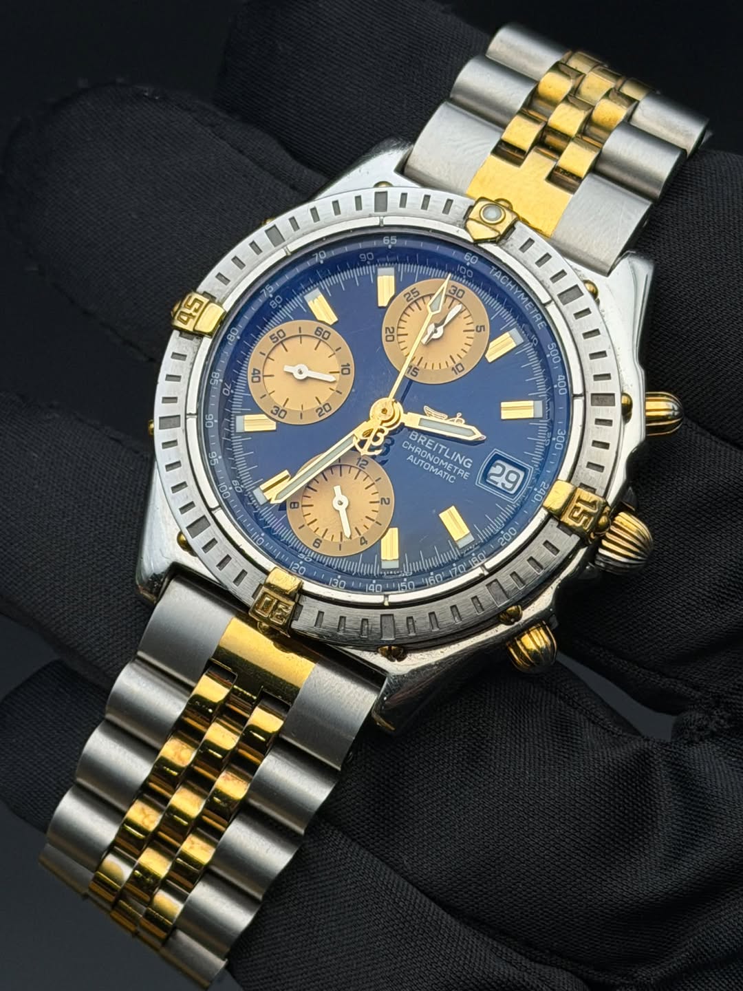 May be an image of wrist watch and text
