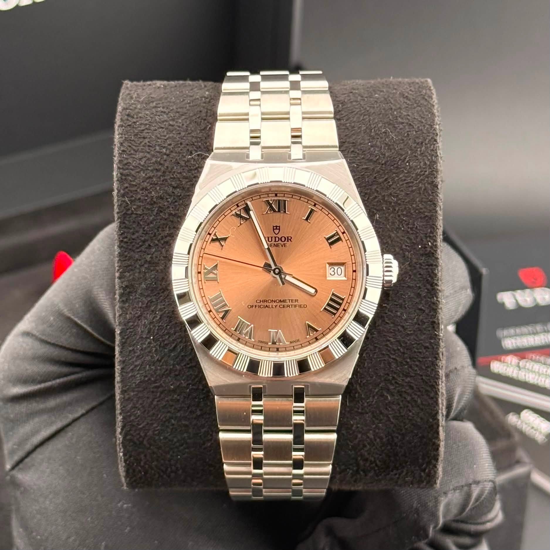 May be an image of wrist watch and text