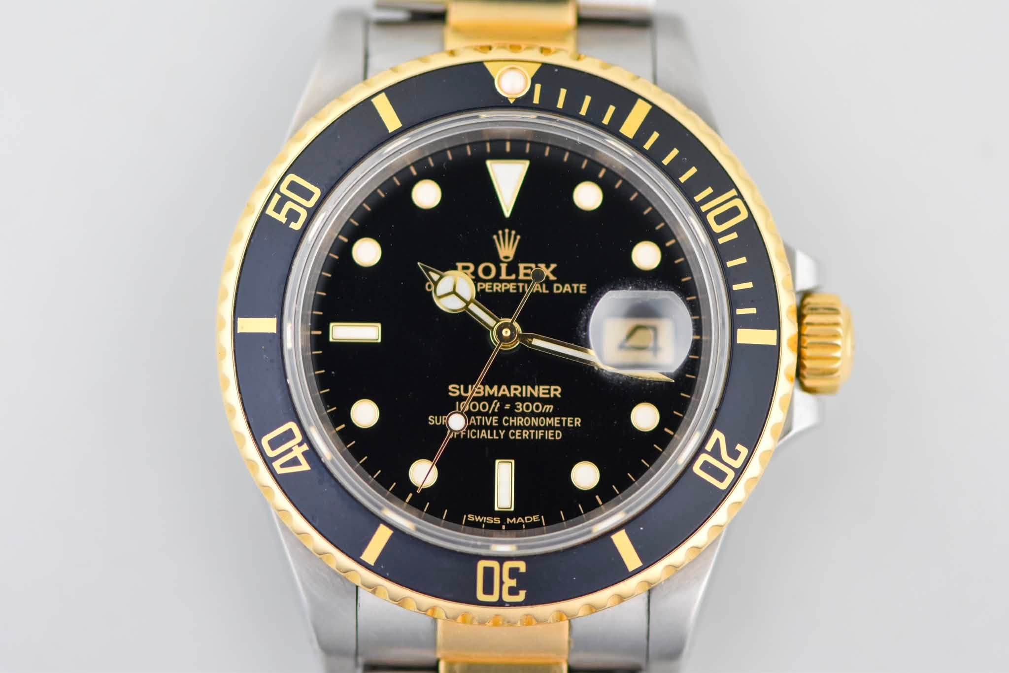 May be an image of wrist watch and text that says '50 ROLEX PERPET PERPETI/ALDATE PETYAL AL DATE סו.ז 10 40 SUBMARINER 9oof 300m SUP ATIVE CHRONOMETER TIVECHRONOMETER ER…