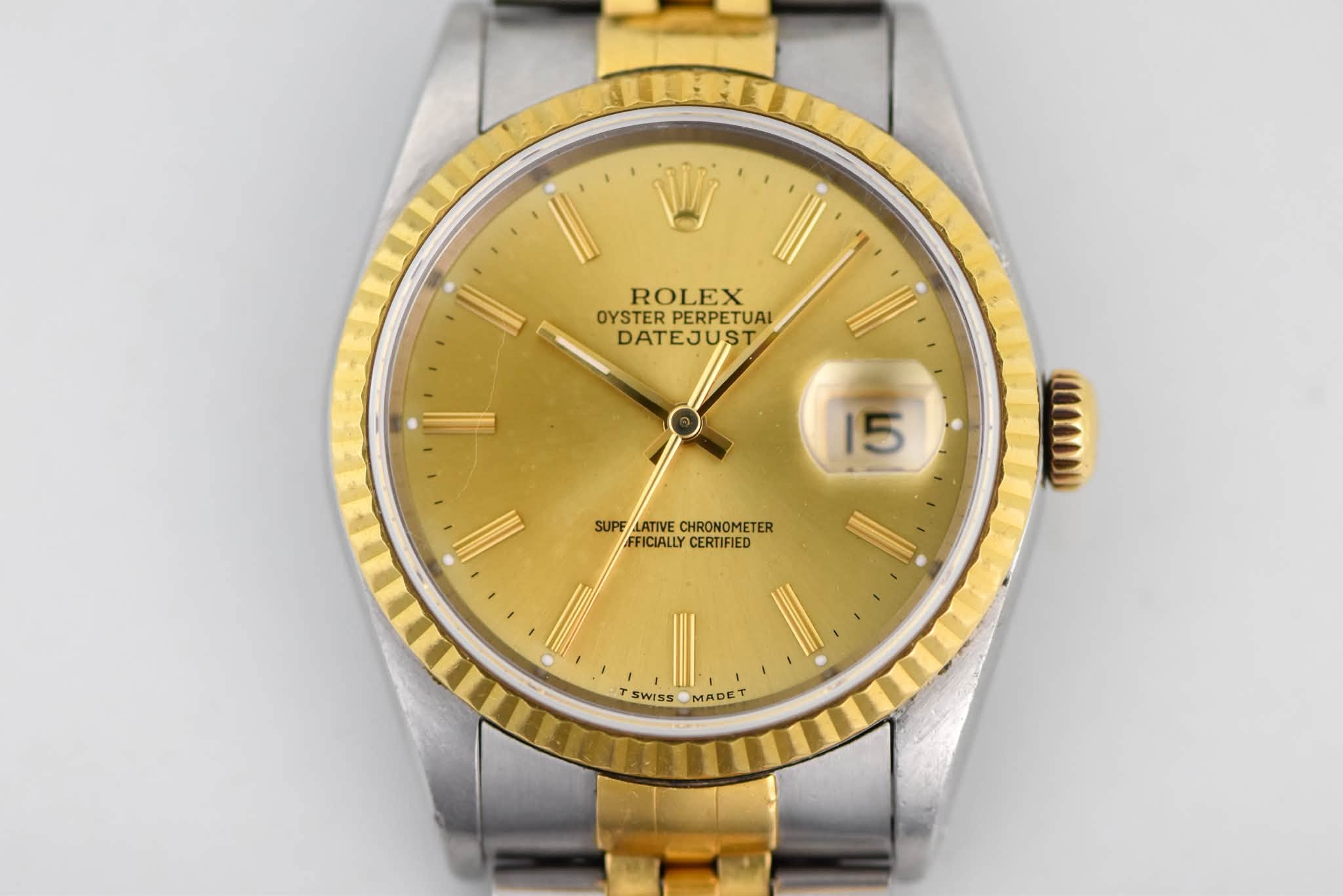 May be an image of wrist watch and text that says 'ROLEX OYSTER PERPETUAL DATEJUST 15 SUPFLATIVECHRONOMETER SUPF LATIVE CHRONOMETER FFICIALLY FFICIALLYCERTIFIED CERTIFIED E แหตอม…