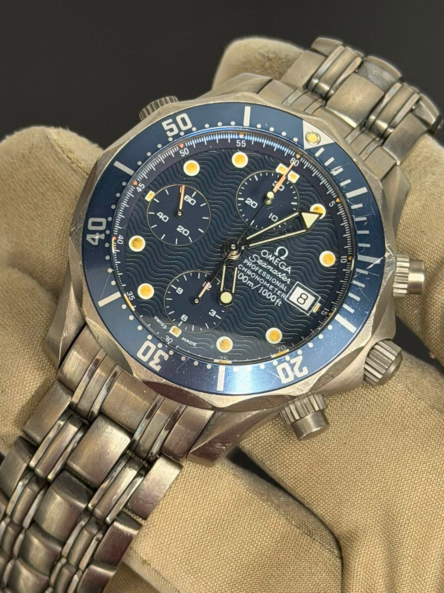 May be an image of wrist watch and text