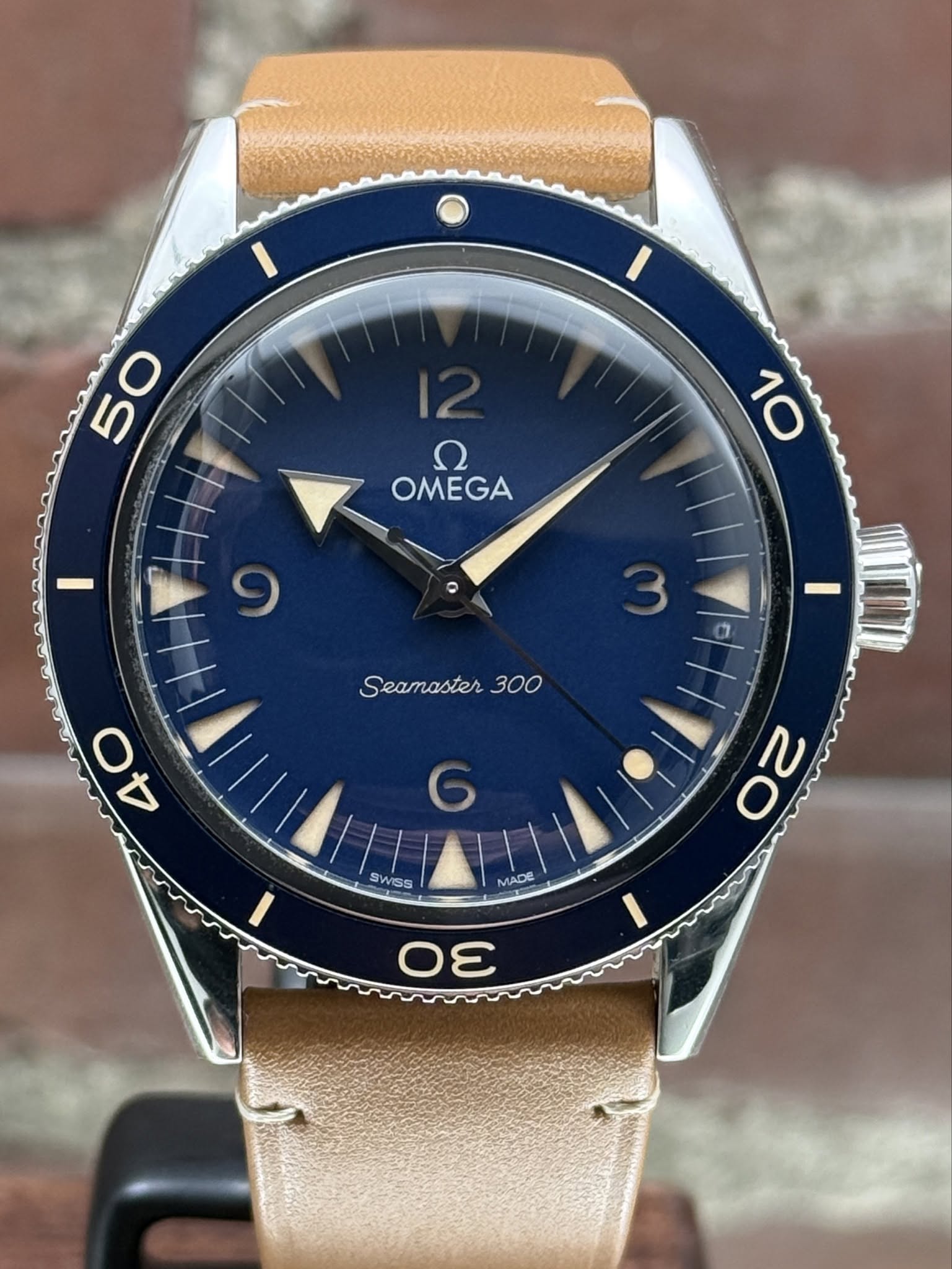 May be an image of wrist watch and text that says '50 ח OMEGA I 10 Seamaster 300 40 4 SWSS MADE Oㄹ σε 3'