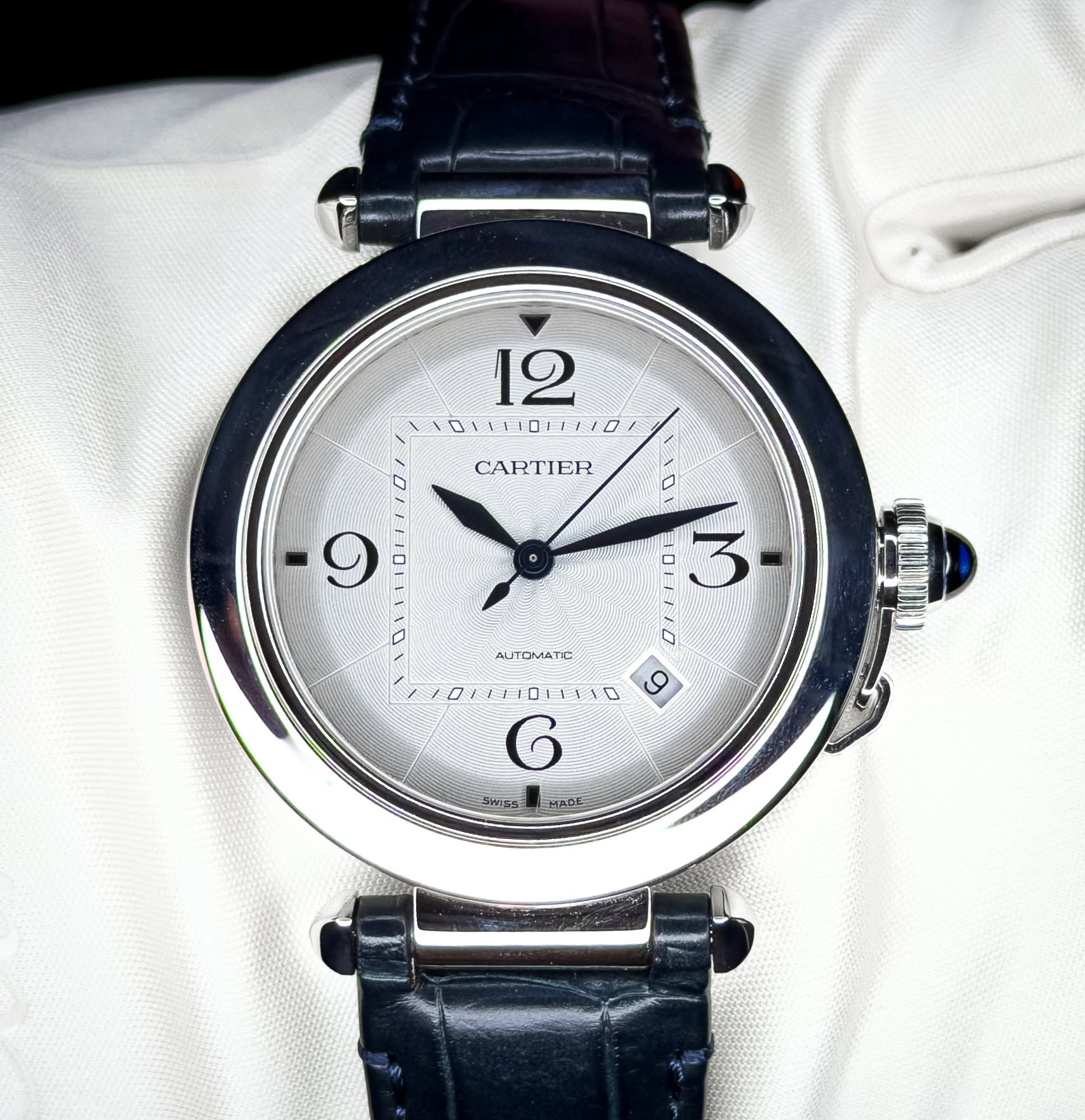 May be an image of wrist watch and text