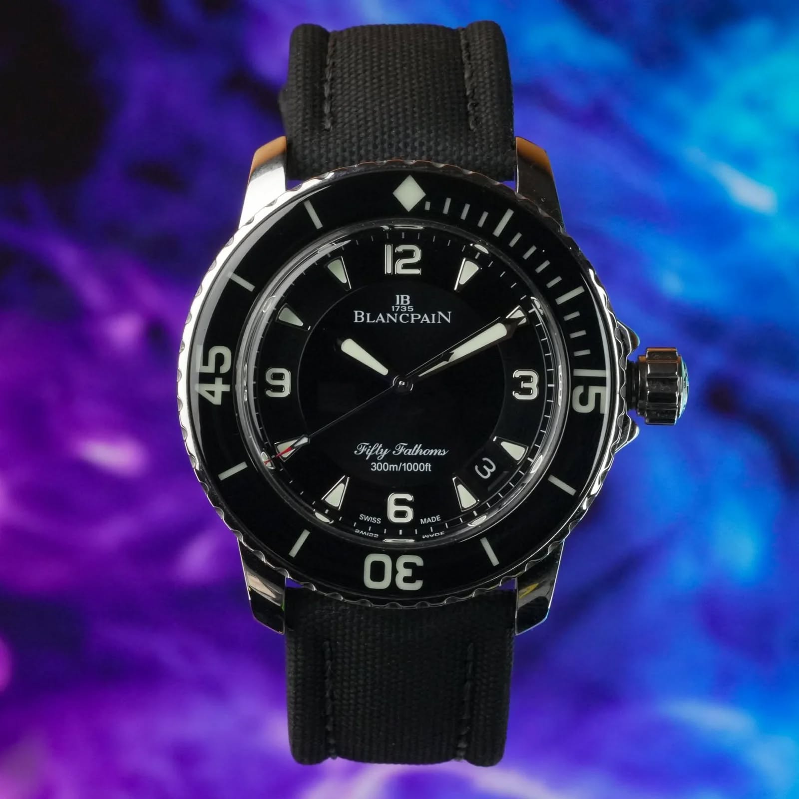 May be an image of digital watch and text that says '1 12 JB BLANCPAIN ٨ ي ER 9 45 D 0, m T 5 س Fifly Falhoms 300m/1000ft 1000ft SISS 6 MADE 3 Wrang A'