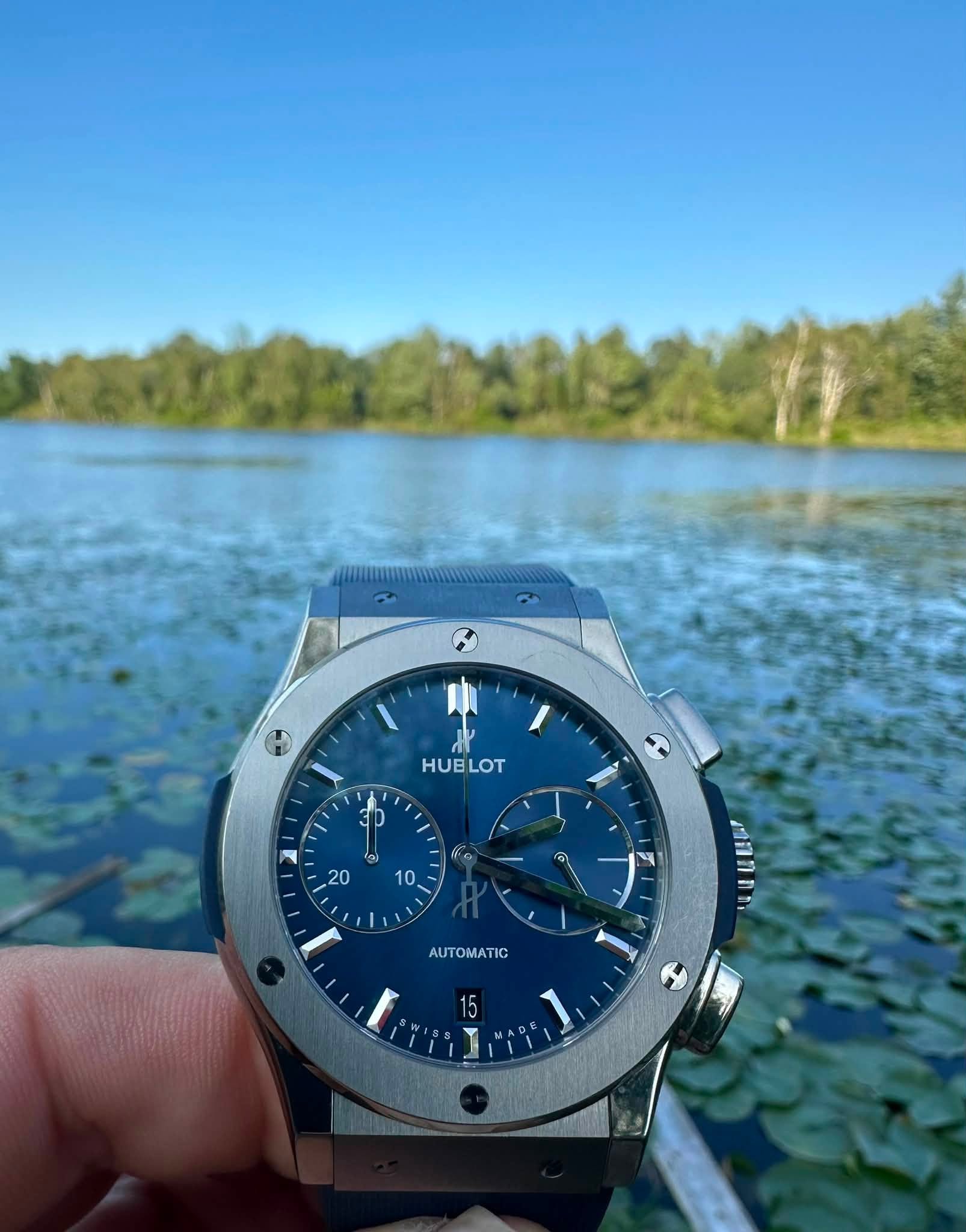 May be an image of wrist watch and text that says 'HUBLOT LOT A ၉် 20 10 I ب AUTOMATIC TIC AUTOM anれt 15'