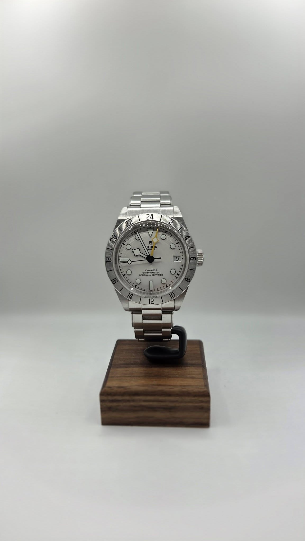 May be an image of wrist watch and text