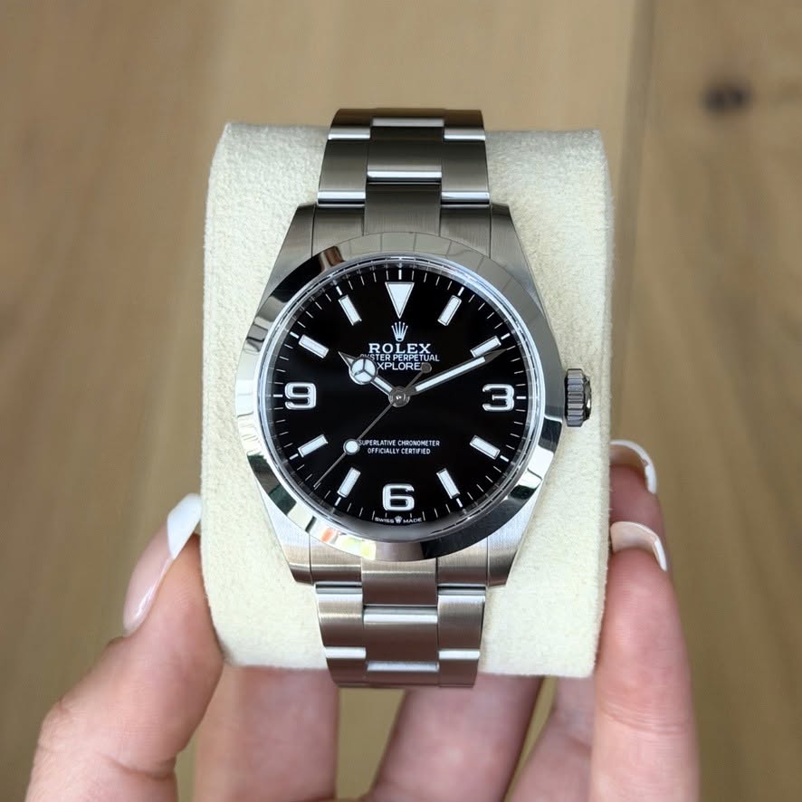 May be an image of wrist watch and text