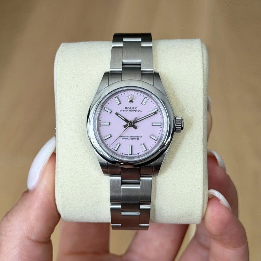 May be an image of wrist watch and text