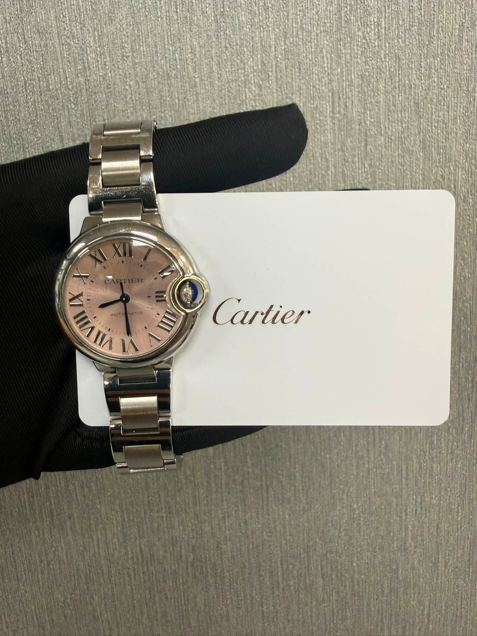May be an image of wrist watch and text that says 'ミ VIIVIIA VIIIA VIII V IMAIA ለው Cartier IX'