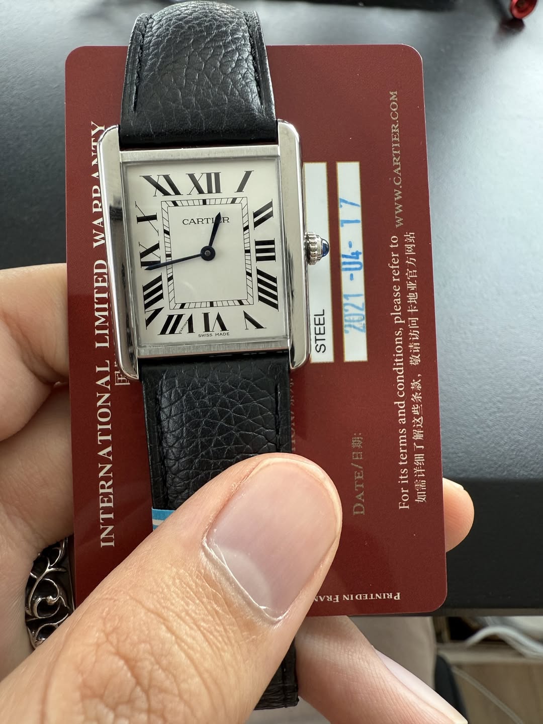 May be an image of wrist watch, leather and text that says 'X XII XXII/ I 도선 m TT CARTI PTUE VM LIMITED لب بام IAI Haw nA IA נמאה ERNATIONAL INTERNATIONA INTERN STEEL RT .com…