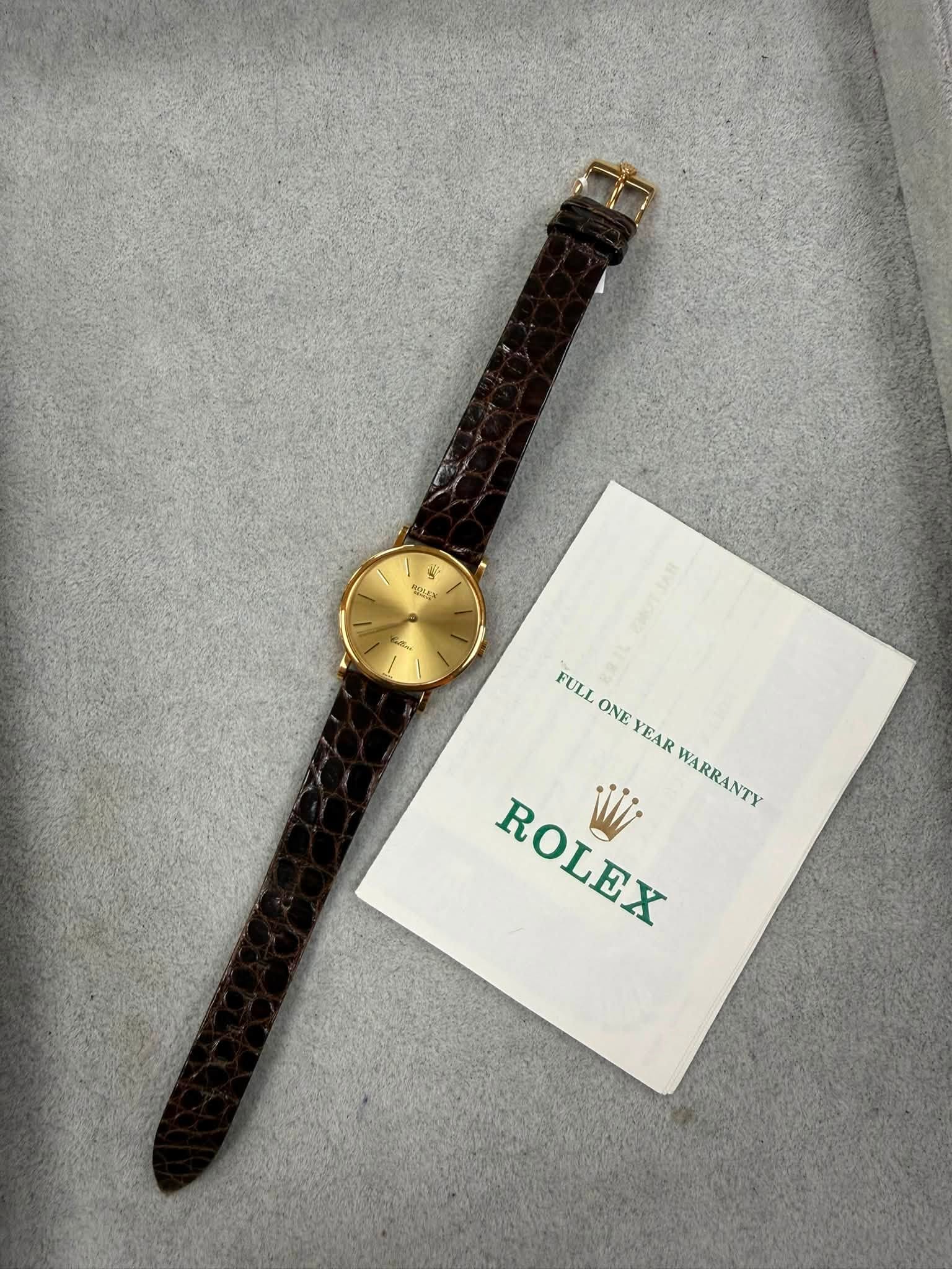 May be an image of wrist watch and text that says 'ApBbl FULL ONE YEAR YARRANTY ROLEX'