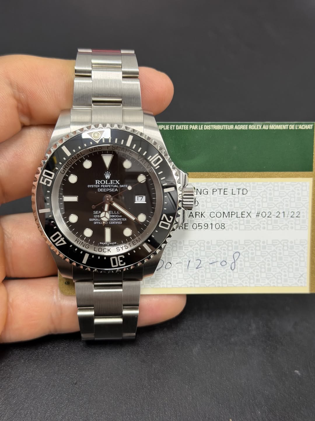 May be an image of wrist watch and text